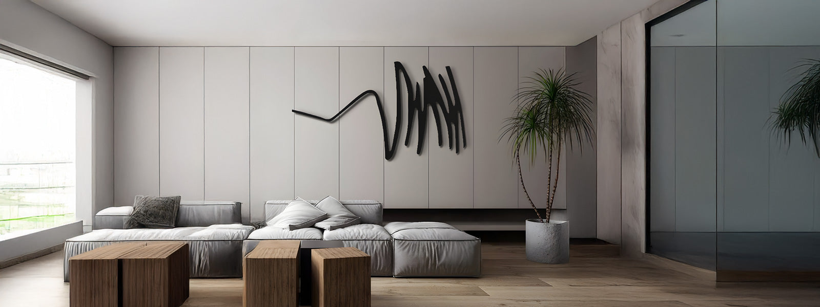 Modern living room with light gray couches, wooden coffee tables, and abstract wall art. Large window on the left, potted plant on the right, and a mirror reflecting the space.