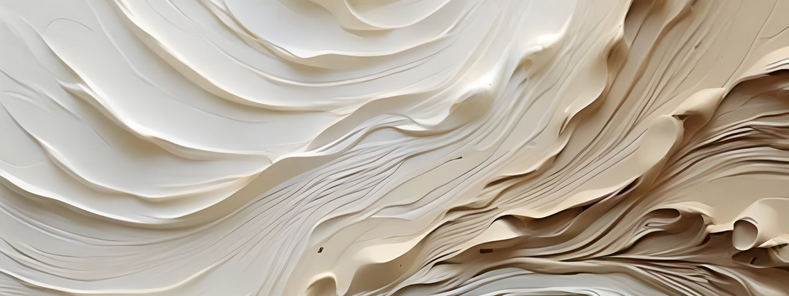 Close-up of layered, flowing beige and cream shapes resembling rippling paper or waves. The texture is smooth with subtle shadows, creating a sense of depth and movement.