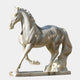 The Giant Sculptures Elegant Striding Horse Marble Outdoor Sculpture - 200cm features a stunning white marble horse with a flowing mane and raised leg on a decorative base, set against a light gray background.