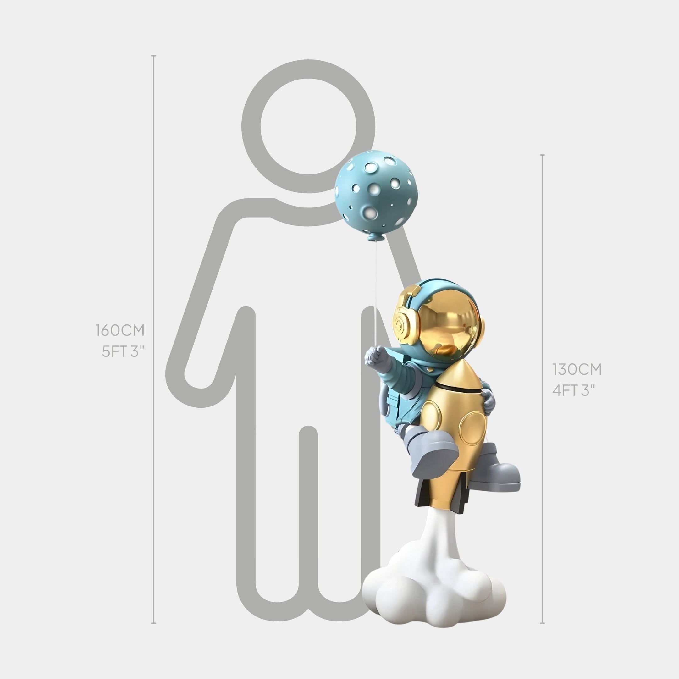 The Giant Sculptures 130 cm Galactic Blue Astronaut figurine in gold and blue stands on a cloud base, holding a dotted Rocket Lift-Off Balloon Sculpture. It is displayed next to a 160 cm silhouette for scale.