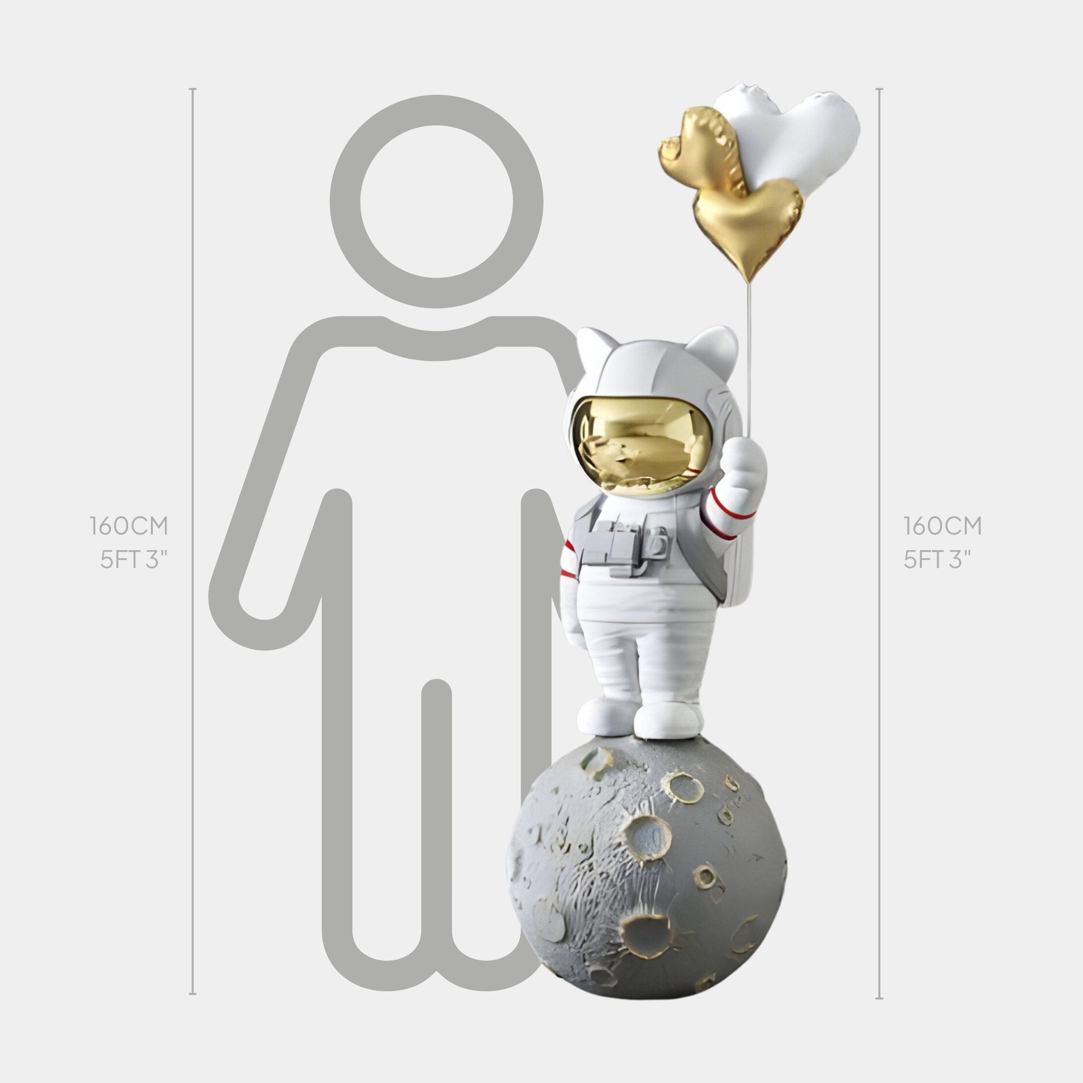 The Nova White Astronaut Kitty Heart Balloons Sculpture by Giant Sculptures, featuring a resin astronaut with a gold helmet holding gold and silver heart-shaped balloons on a moon base, is paired with a 160cm human silhouette for scale, ideal for balloon decor fans.