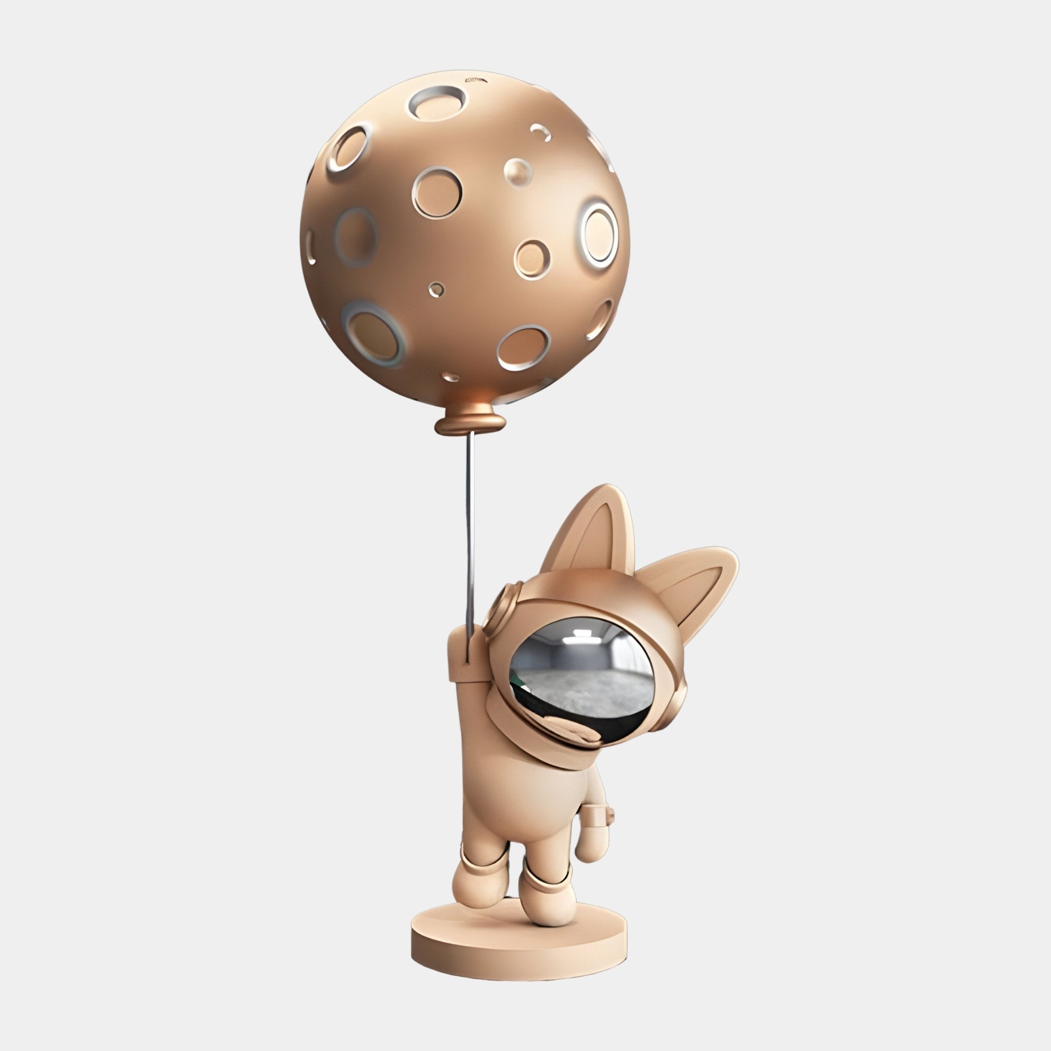 The Rose Gold Astronaut Bunny Moon Balloon Sculpture by Giant Sculptures features a small bunny figurine with a shiny helmet and reflective visor, holding a large, cratered moon-like balloon. The entire 60cm sculpture gleams in metallic rose gold.