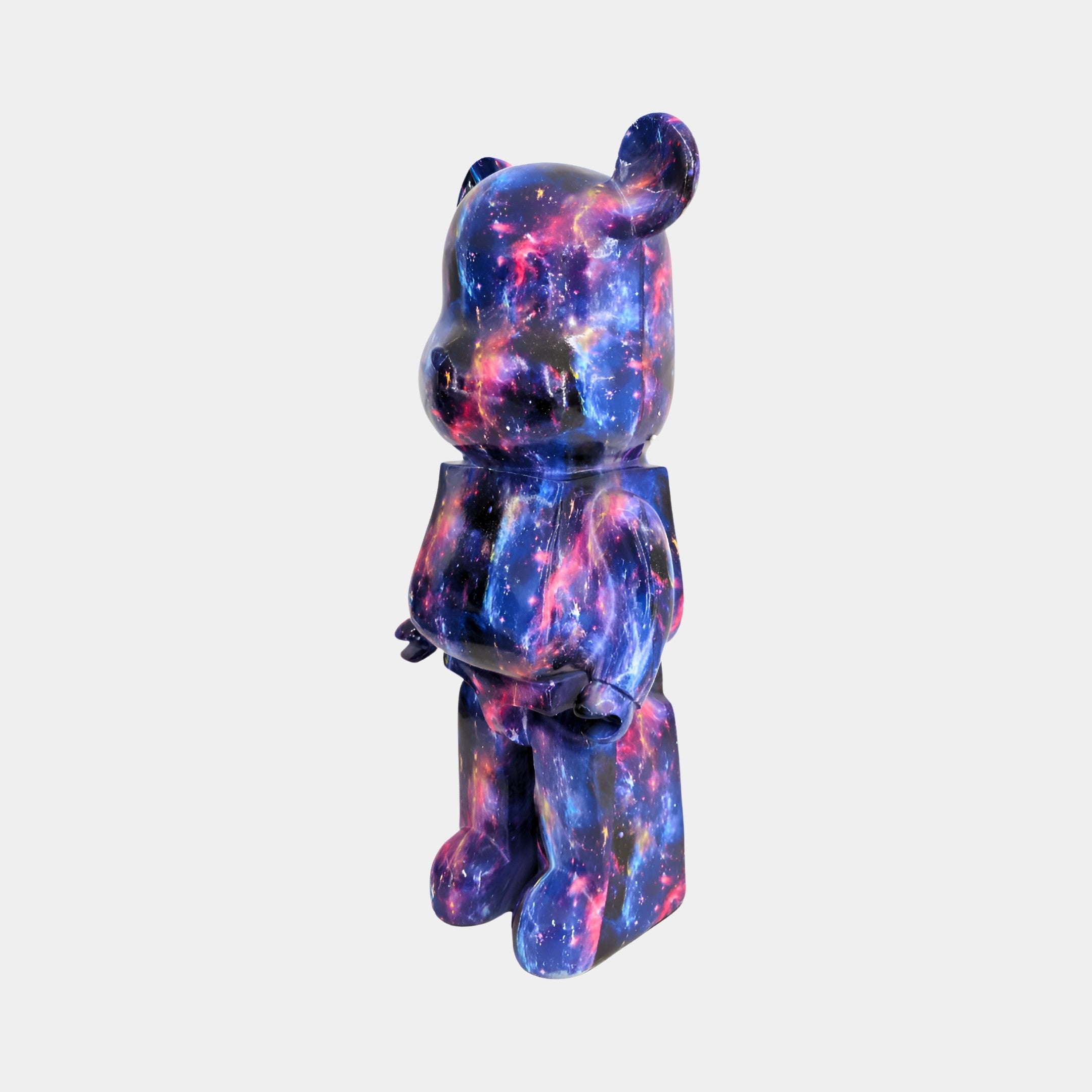 Profile view of 50cm Cosmic bear sculpture featuring cosmic design with vibrant colors.