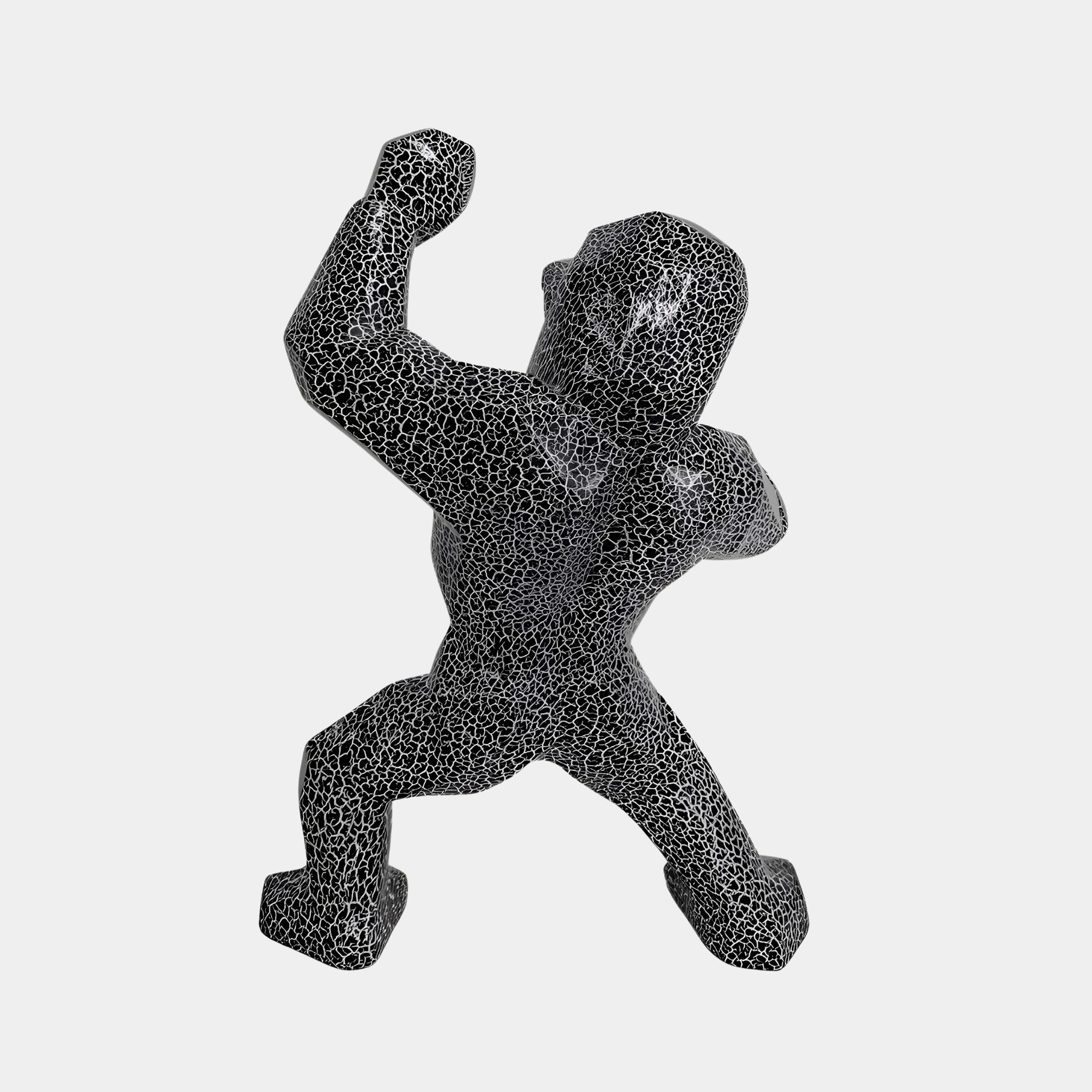 Back view of Magma Gorilla sculpture, displaying the deep black texture and dynamic pose, suitable for nature-inspired luxury decor.