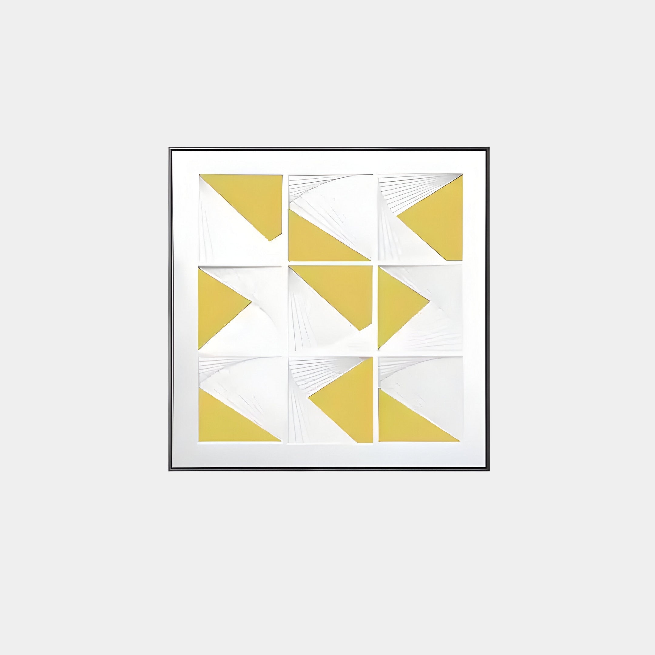 The Prismatics Yellow Geometric Cardboard Carving Wall Art by Giant Sculptures is a framed abstract piece with nine yellow and white designs featuring triangles and curves on a light gray background, housed in an elegant aluminium alloy frame.