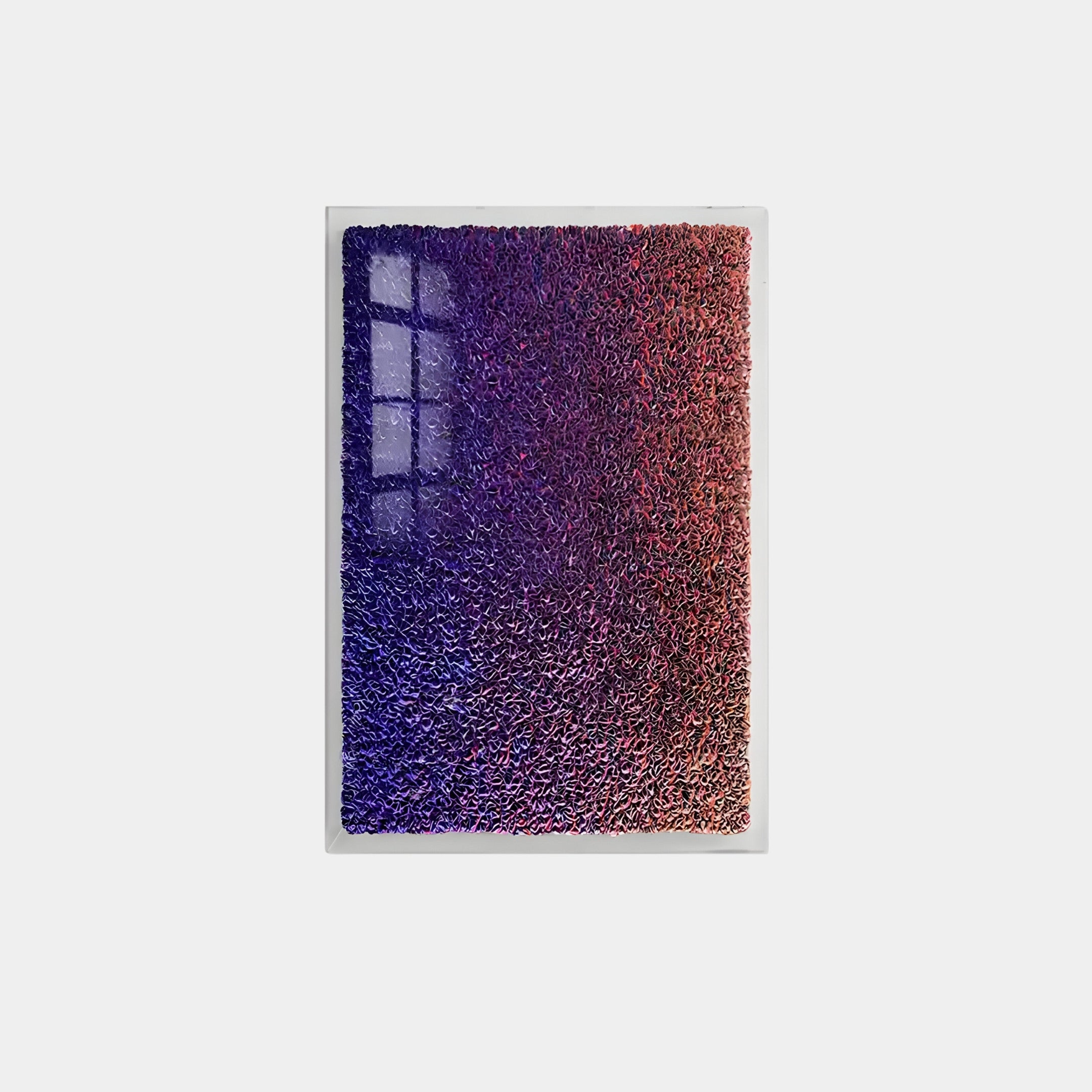 The Chromatica Vertical Vibrant Purple Gradient Paper 3D Wall Art by Giant Sculptures features a textured surface with a gradient from deep blue to vibrant red and hints of purple, offering a contemporary aesthetic that reflects light and shadows dynamically.