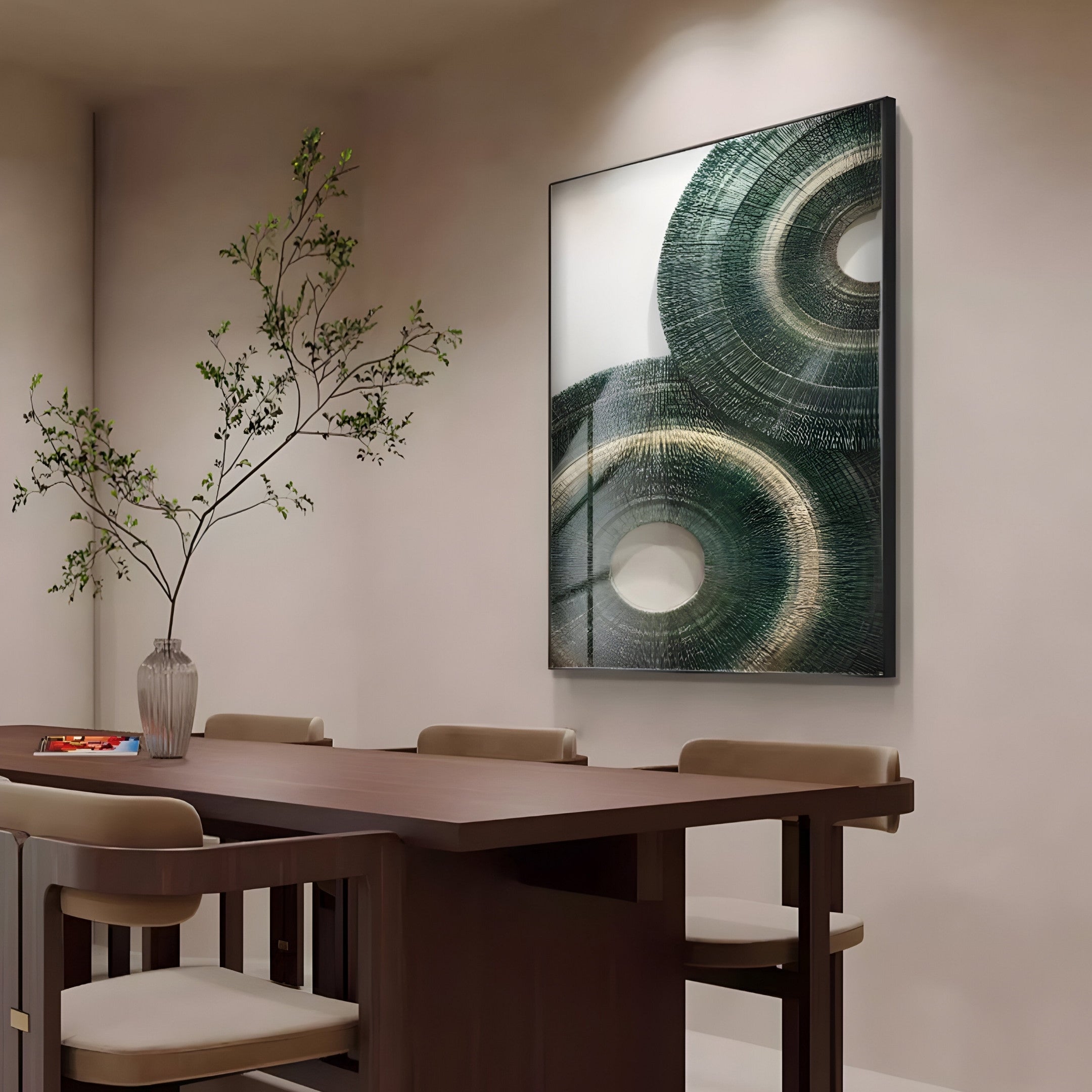 A modern dining room features a wooden table, beige chairs, and greenery in a vase. The minimalist space includes the Auralis Green Dual Concentric Circular Cardboard Craft Wall Art by Giant Sculptures, perfectly harmonizing with the contemporary decor.