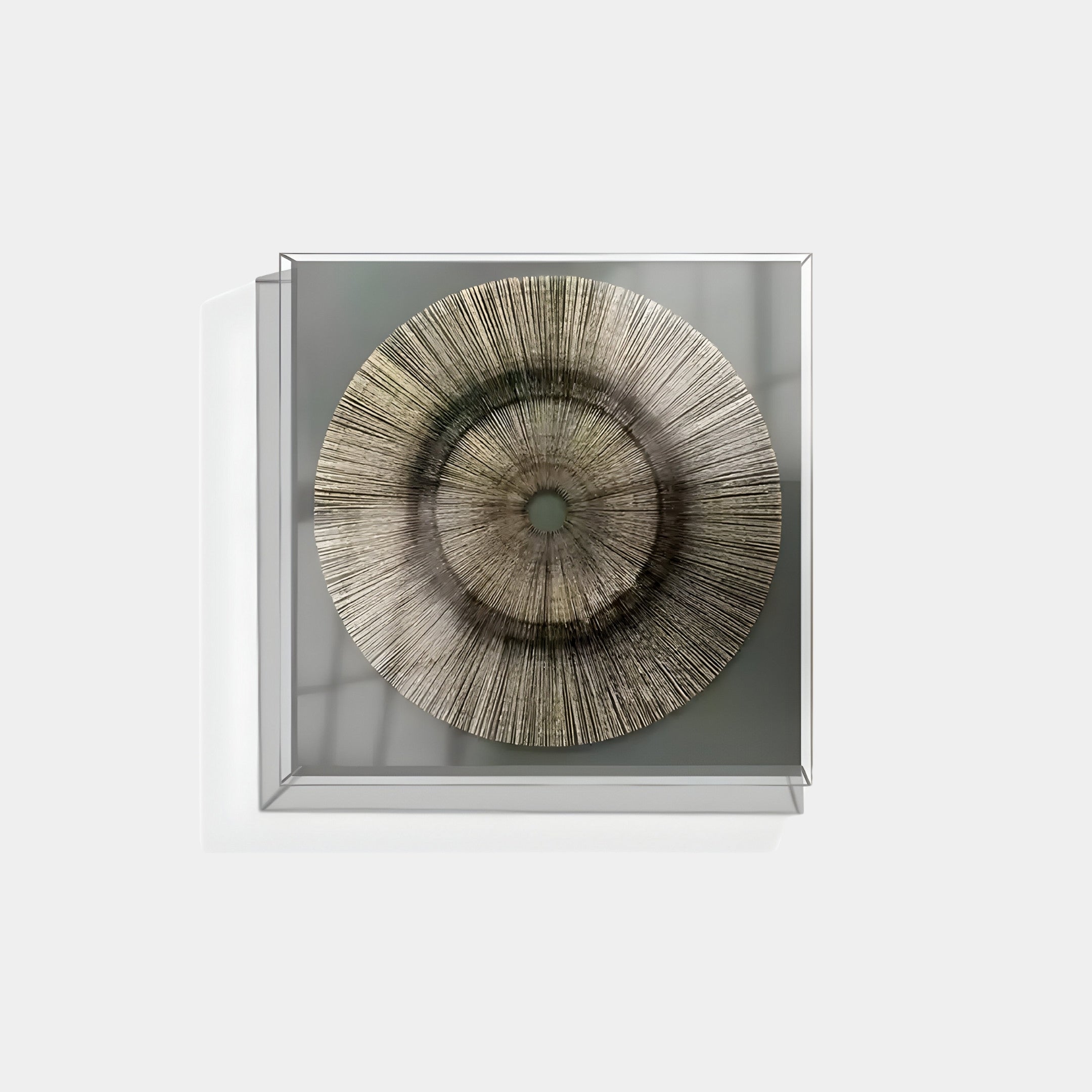 The Oculis Earthy Balance Square Handmade 3D Paper Wall Art by Giant Sculptures features a radial pattern with gray and beige tones, resembling concentric circles. Mounted on a light background, it creates a subtle shadow for added depth and dimension.