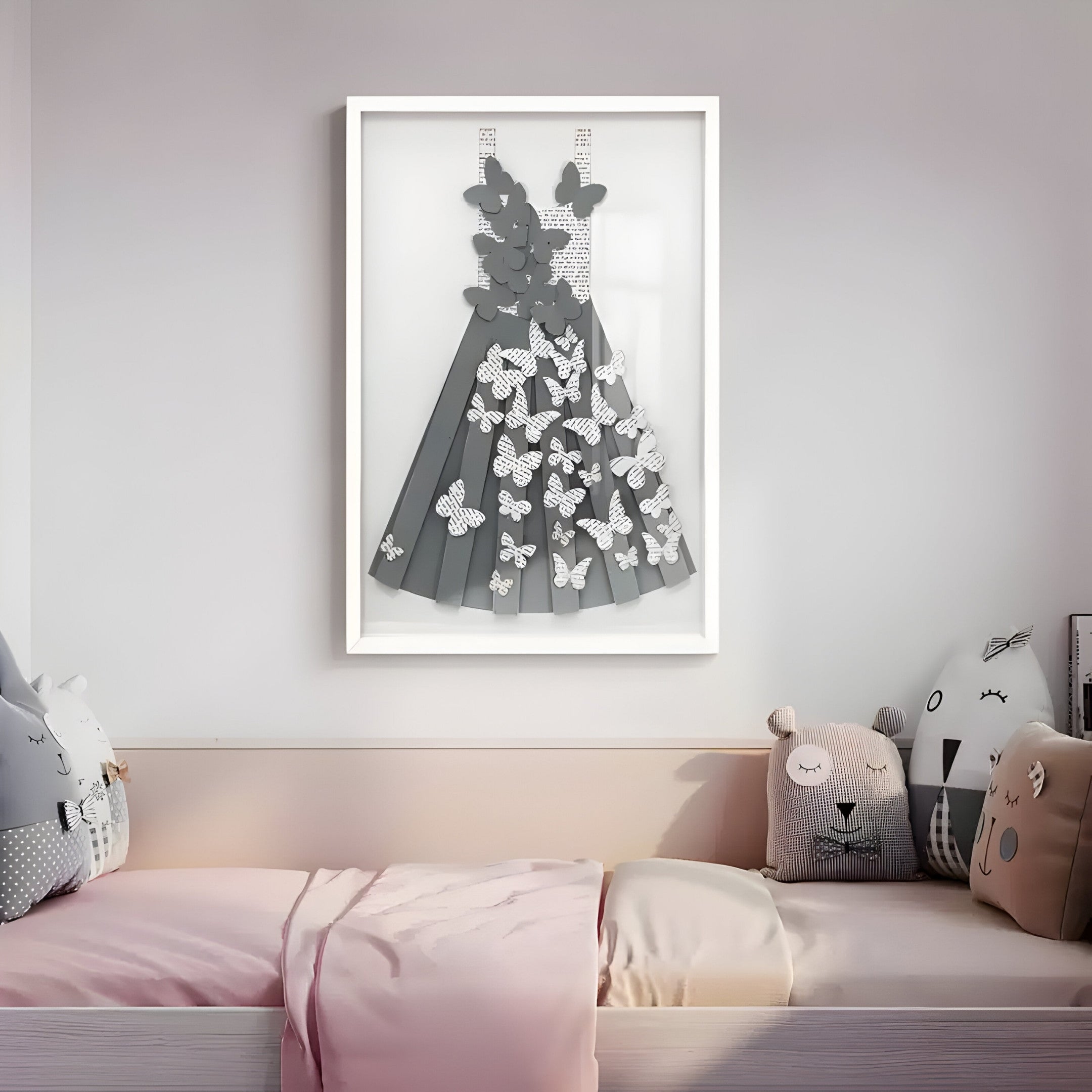 A cozy Nordic-inspired bedroom showcases a light-colored bed with charming animal cushions. Above, the Flutter Charcoal & White Butterfly Dress 3D Wall Art by Giant Sculptures captivates with its black and white paper butterflies, creating a soft and serene ambiance.