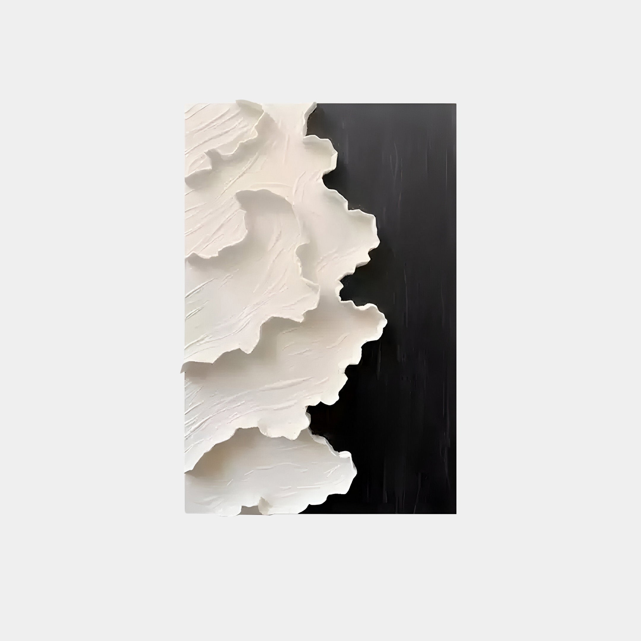 The Stratura III Black & White Layered Paper Canvas Wall Art by Giant Sculptures features an abstract design with white shapes on the left against a black background, creating a topographic map or cascading waves effect.