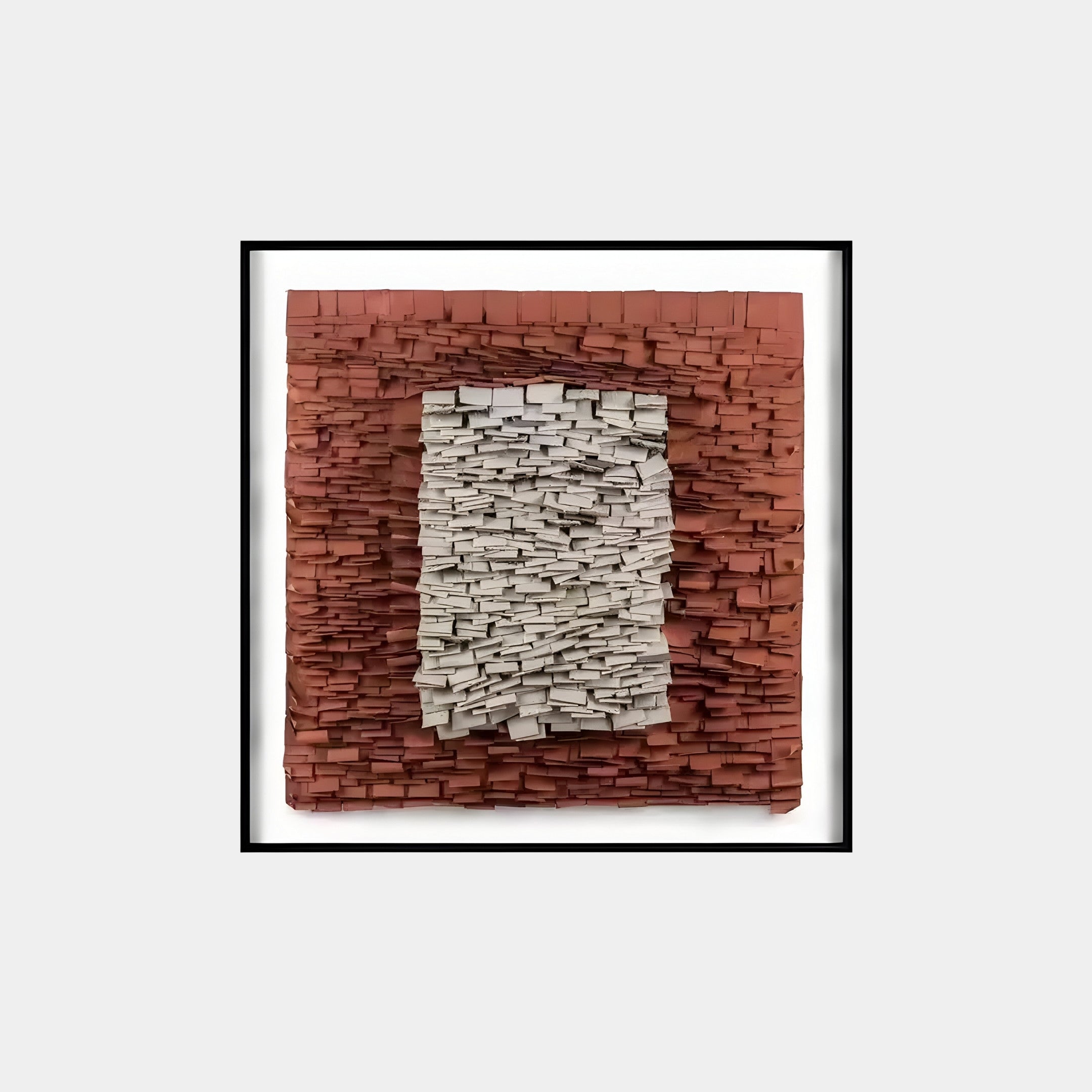 The Terracova Red Frame Textured Cardboard Square 3D Wall Art by Giant Sculptures features layered rectangles in a textured pattern. A white center is surrounded by deepening red and brown tones against a light gray backdrop, offering an abstract design.