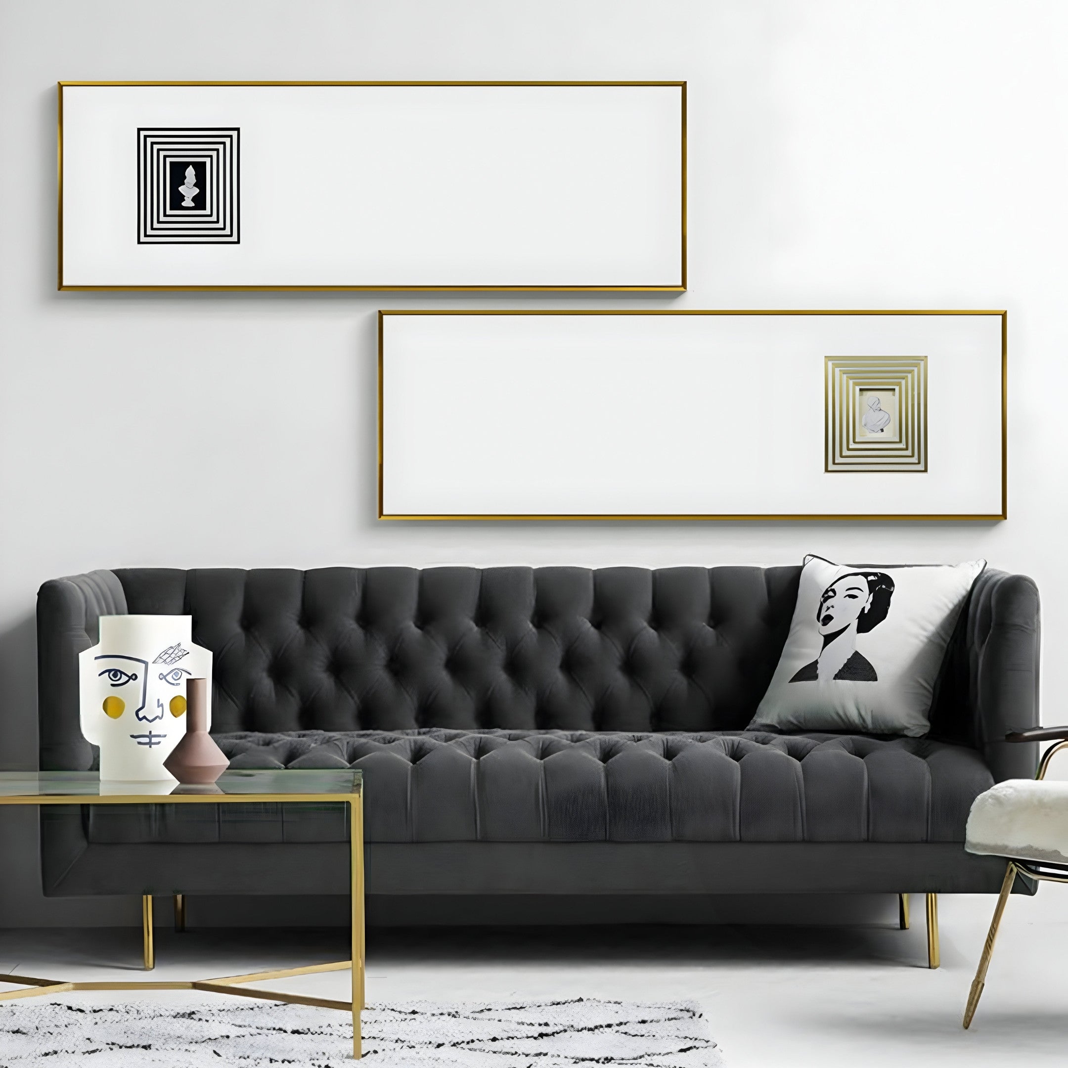 A modern living room showcases a black tufted sofa, an artistic face-design cushion, and a glass coffee table. Lustreline Black & White Left Plaster Statue Cardboard Wall Art by Giant Sculptures graces the walls. Geometric decor pieces enhance the tables look, and a striped rug covers the floor.