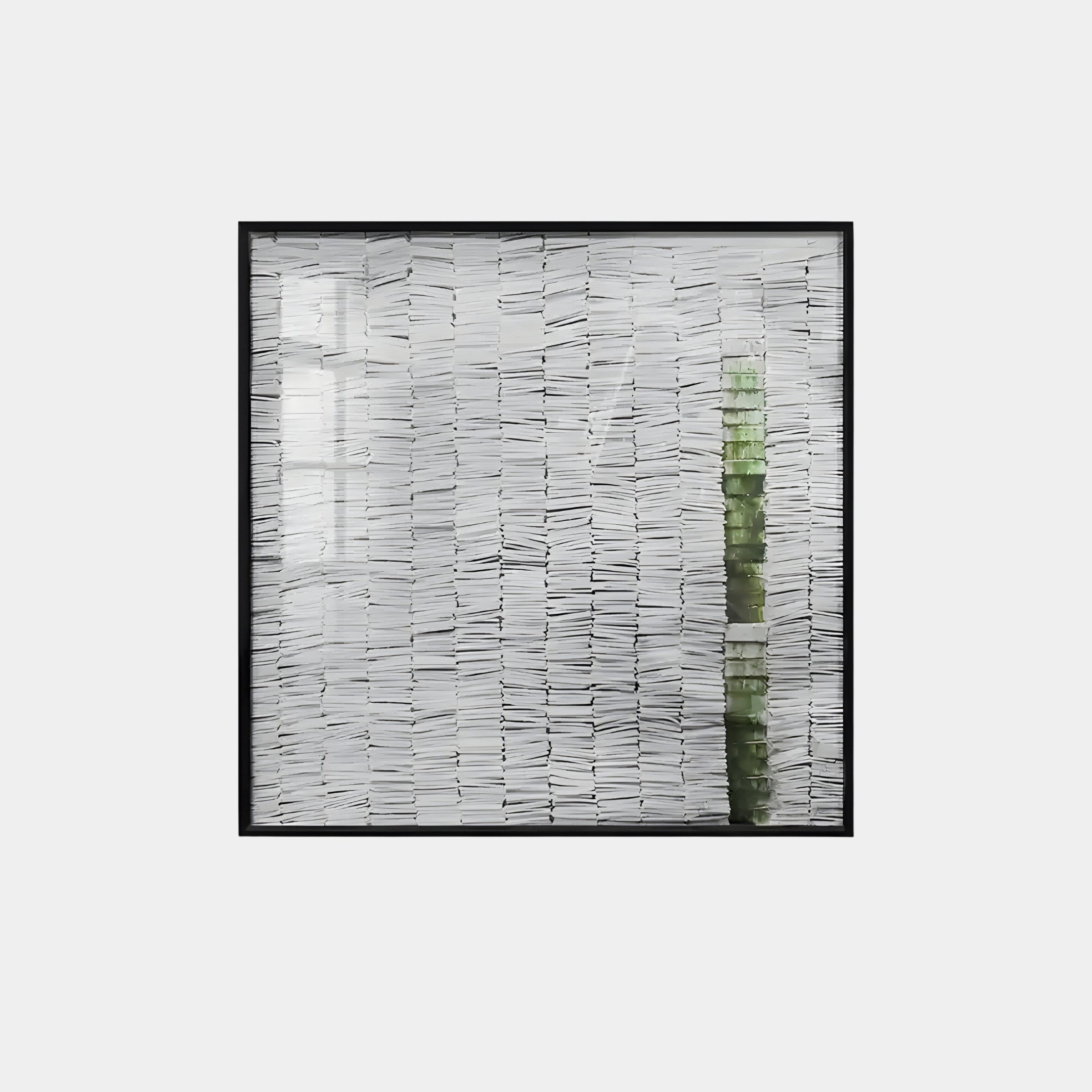 The Tracery V Green & White Textured Paper Wall Art by Giant Sculptures features a striking pattern of neatly stacked white papers, accented by a vertical line of translucent green on the right, offering a contrasting and minimalist modern aesthetic.