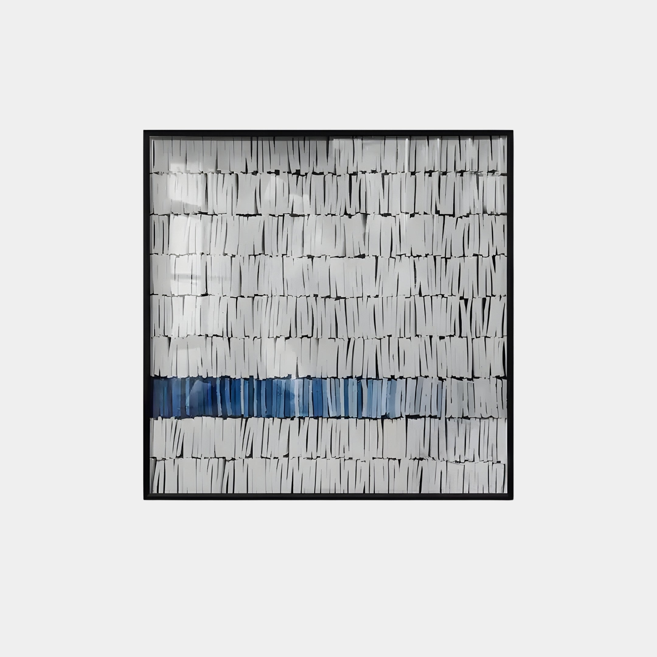 The Tracery III Blue & White Textured Paper Wall Art by Giant Sculptures showcases geometric elegance with black-framed abstract design, featuring rows of vertical white rectangles and a dynamic blue horizontal stripe against a light gray backdrop—ideal for contemporary interiors.