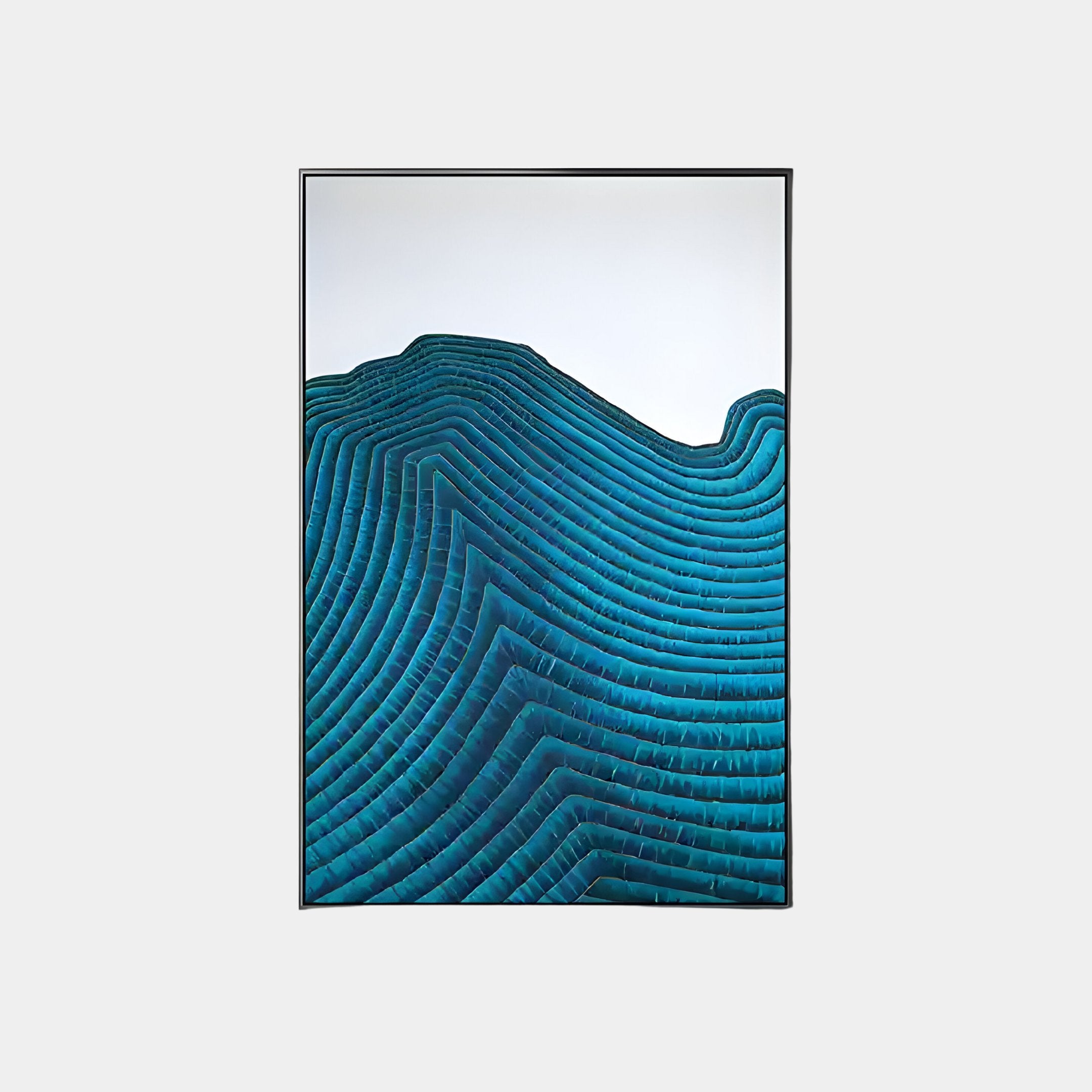 The Ripplewave II Abstract Blue Decorative Enamel Wall Art by Giant Sculptures offers framed waves against a light background, evoking depth and movement like mountain landscapes or water currents. It perfectly complements modern luxury decor.