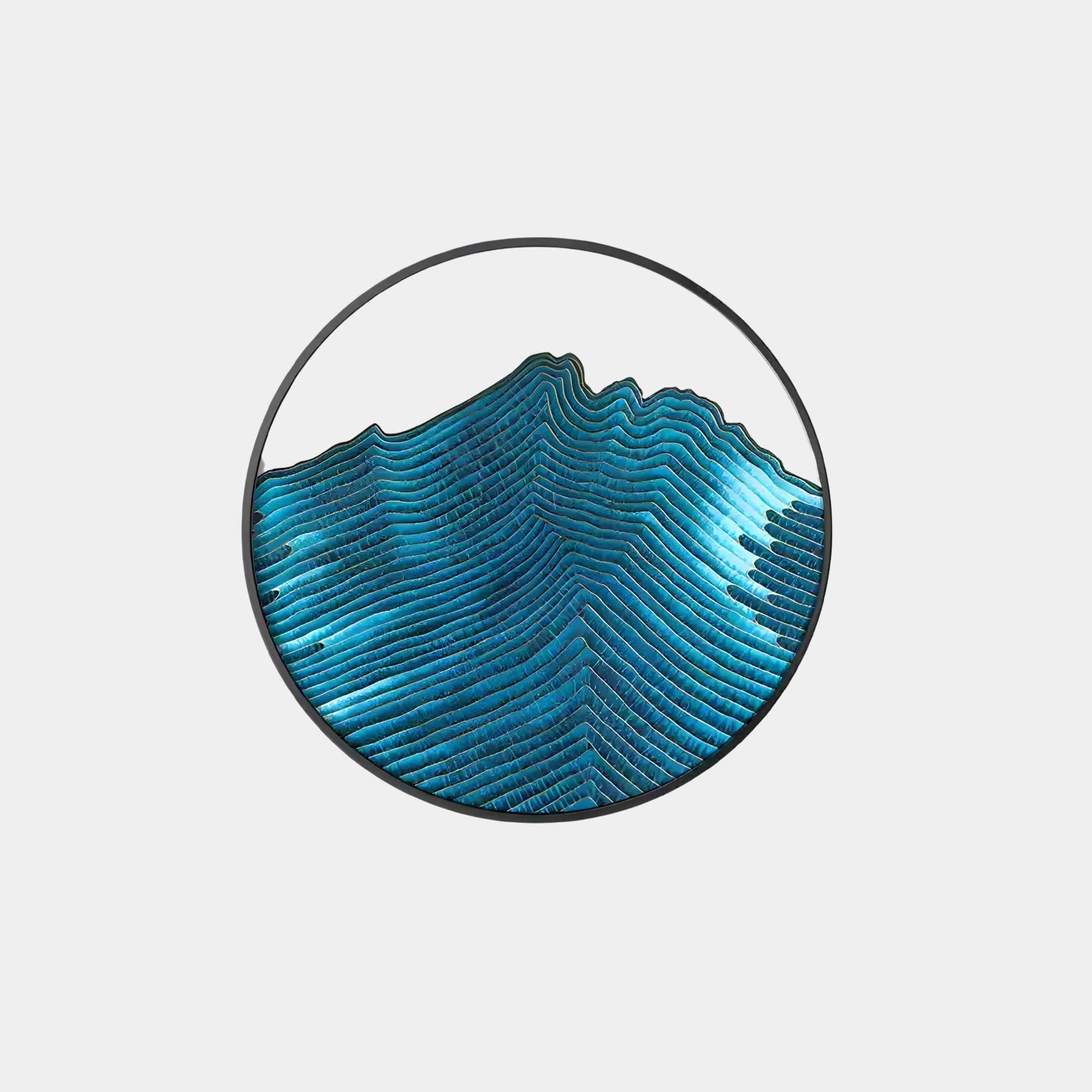 The Auric III Blue Wave Abstract Copper Wire Enamel Round Wall Art by Giant Sculptures features a captivating circular design of topographic lines in blue and turquoise, creating a wave-like texture with copper wire accents.