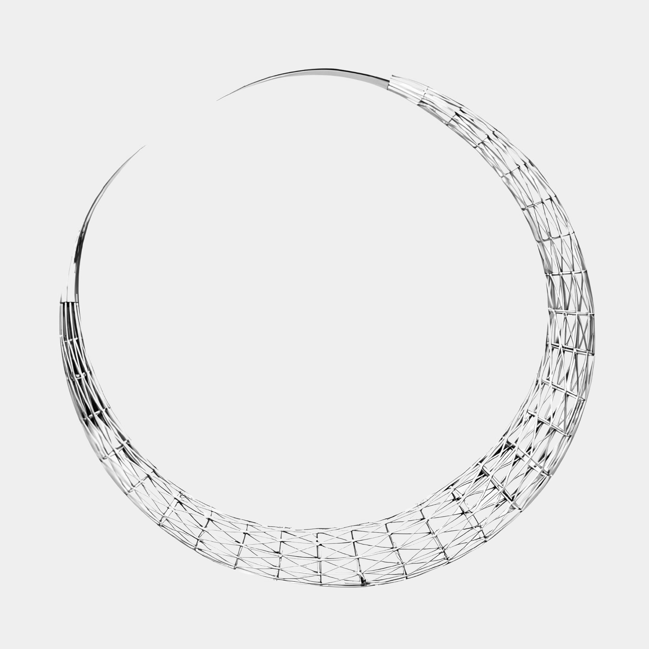 Large abstract silver circular outdoor sculpture with an intricate, open weave design displayed near a modern patio.