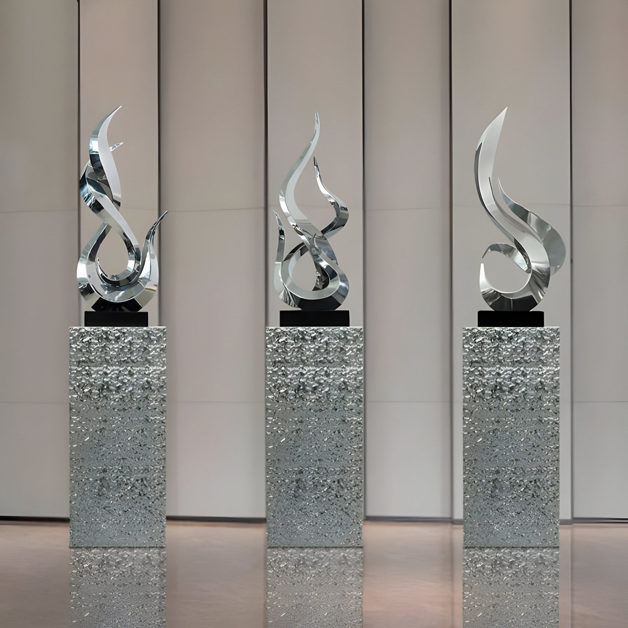 Three Flame IV Abstract Steel Sculptures by Giant Sculptures, each 85 cm tall, display dynamic twists atop textured pedestals. Vertical panels in a modern interior enhance their sleek, flame-inspired appearance.