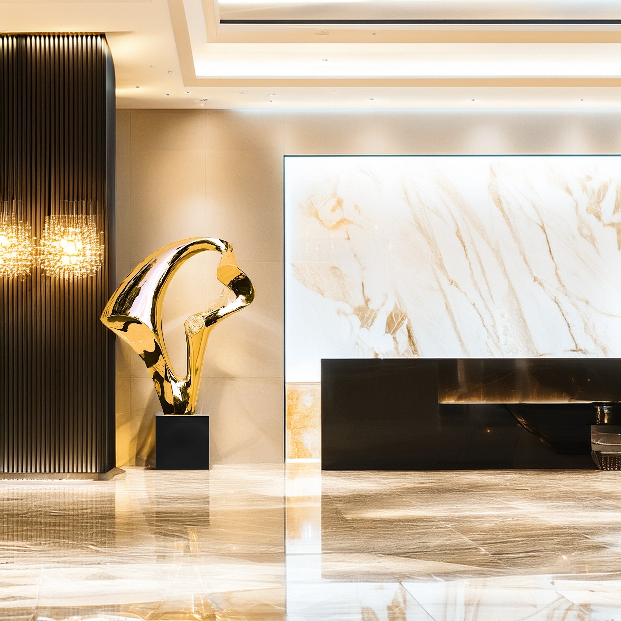 The luxurious hotel lobby features a polished marble floor and the Flow II Gold Organic Steel Sculpture by Giant Sculptures. A textured black wall with ornate lighting contrasts against this, crafting a sophisticated and modern ambiance.