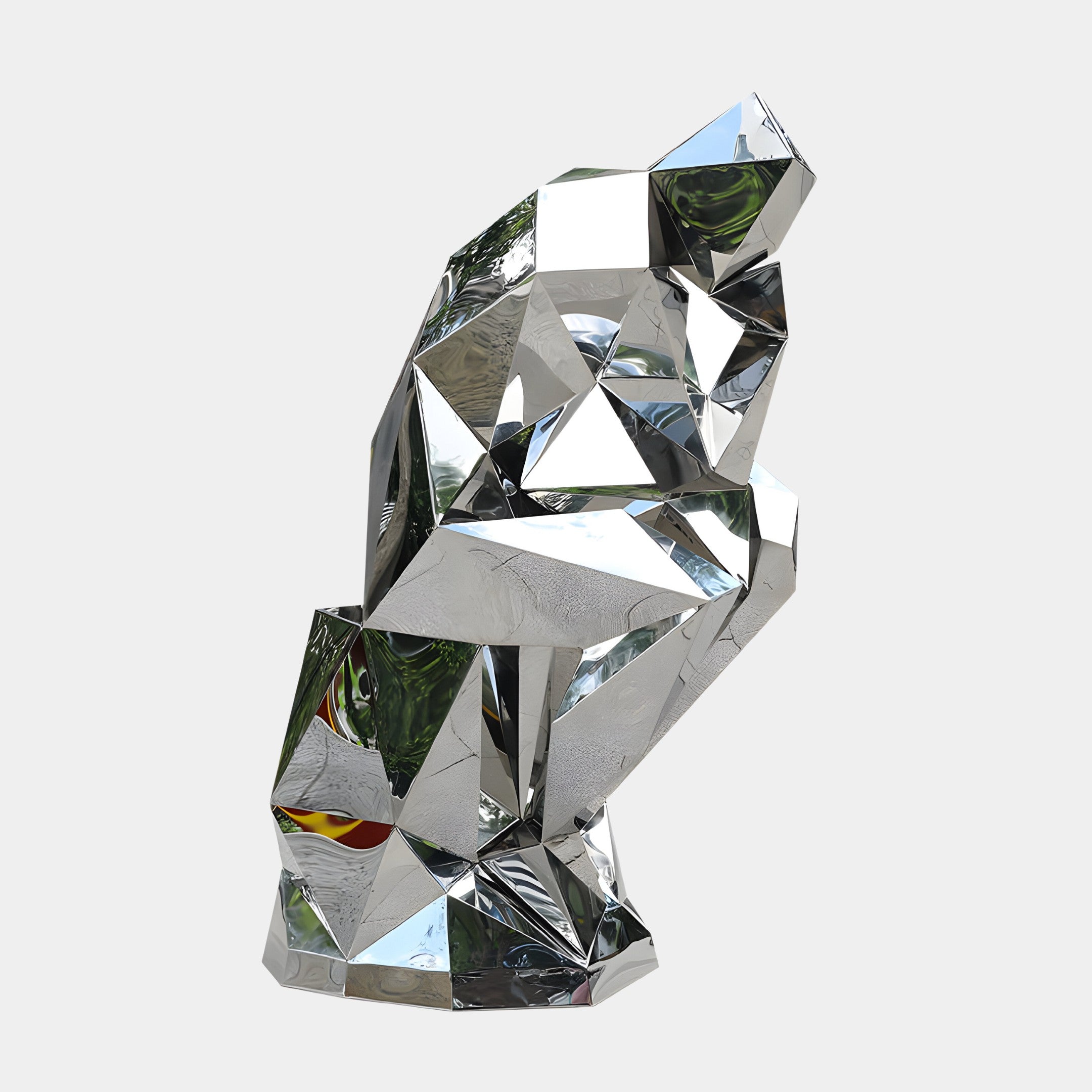 Abstract geometric silver human sculpture, seated with a bent knee, made from faceted, mirror-like polygons, reflecting its surroundings.