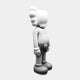 The 168cm Ex-Display Slay Grey Iconify Standing Sculpture by Giant Sculptures is a modern piece featuring a cartoon-like character facing right with large shoes and gloves, X-marked eyes, buttons on shorts, round nose, and fluffy hair—ideal for contemporary interiors.