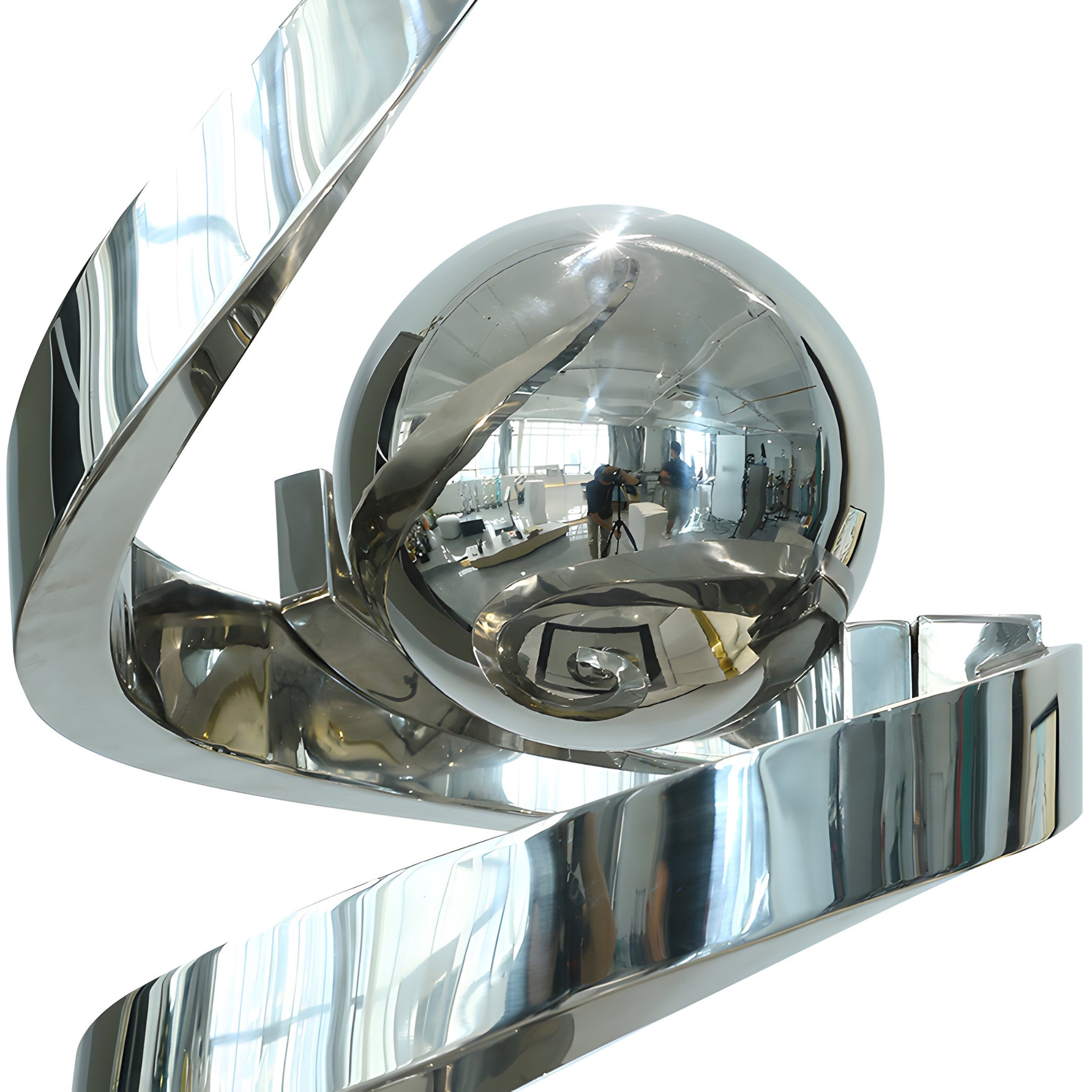 Close-up of polished stainless steel twist sculpture detail, highlighting the dynamic interplay of light on abstract curves.