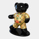 Presenting the Gacko Gucci Bear Sculpture - 165cm by Giant Sculptures: a glossy black bear in a designer logo outfit. It stands on a sleek black oval base with a dynamic pose that embodies modern luxury and Pop Art collaboration in an eye-catching display.