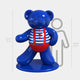 The Gacko Sailor Bear Sculpture by Giant Sculptures is a limited edition, 165 cm (5 ft 5 in) Pop Art figure styled as a large, shiny blue bear in a striped shirt and red suspenders. Displayed with a grey silhouette of a person at 150 cm (4 ft 11 in), it emphasizes the sculptures impressive height.