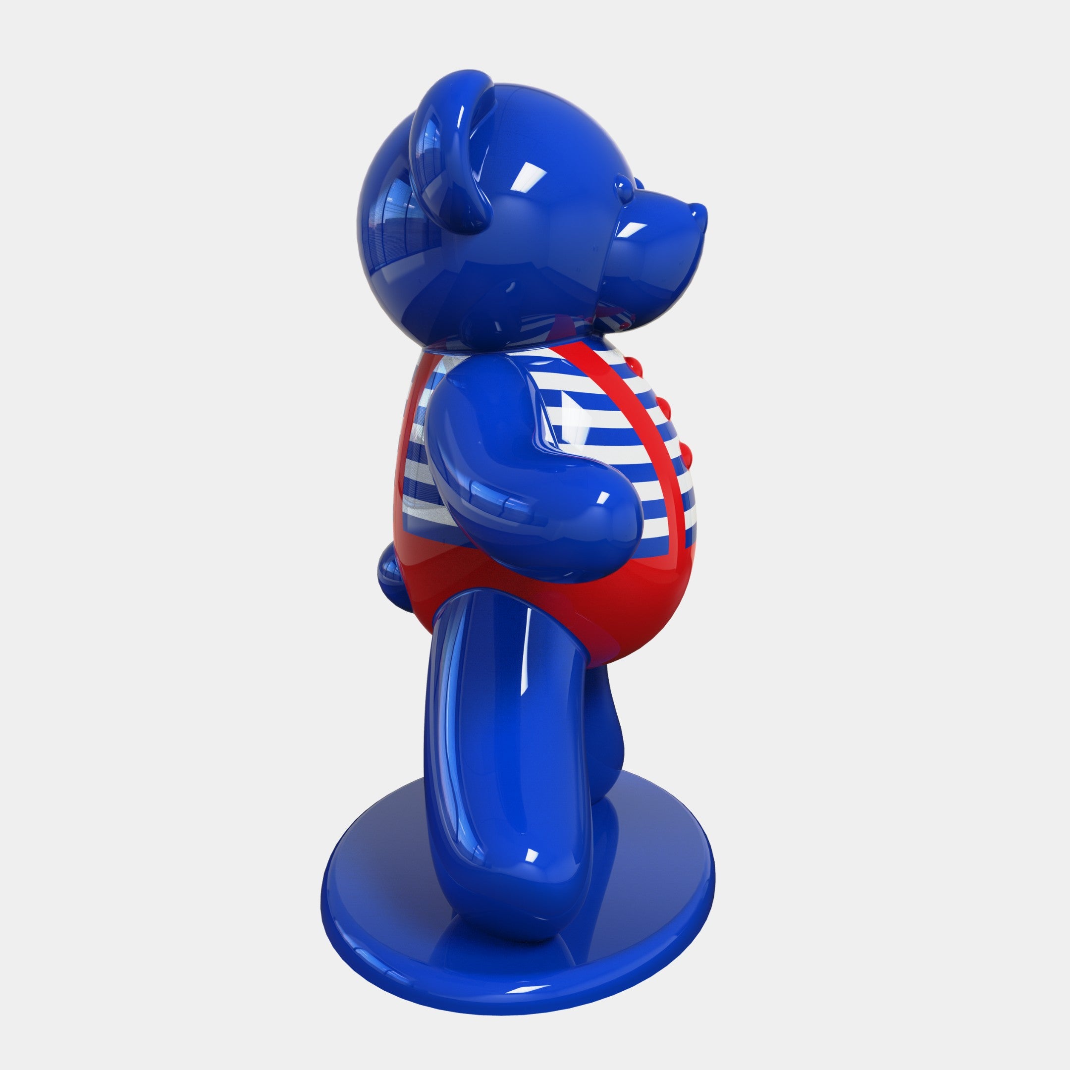 The 165cm Gacko Sailor Bear Sculpture from Giant Sculptures stands on a round base with a glossy finish, facing left. It features a vibrant red, white, and blue striped sailor swimsuit, crafting a delightful piece of nautical pop art by André Gacko.