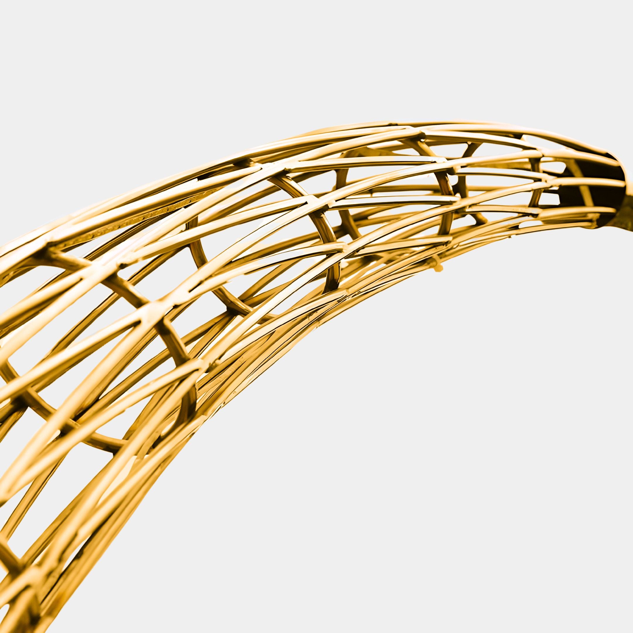 The Crescent Gold LED Wireframe Outdoor Steel Sculpture by Giant Sculptures stands 242cm tall, featuring a gold metallic arch with a grid-like structure against a light gray background. It beautifully blends curves and straight lines into complex geometric patterns.