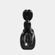 The Onyx Black Balloon Dog Sculpture - 80cm by Giant Sculptures features abstract, rounded, bulbous forms stacked vertically against a plain white background.