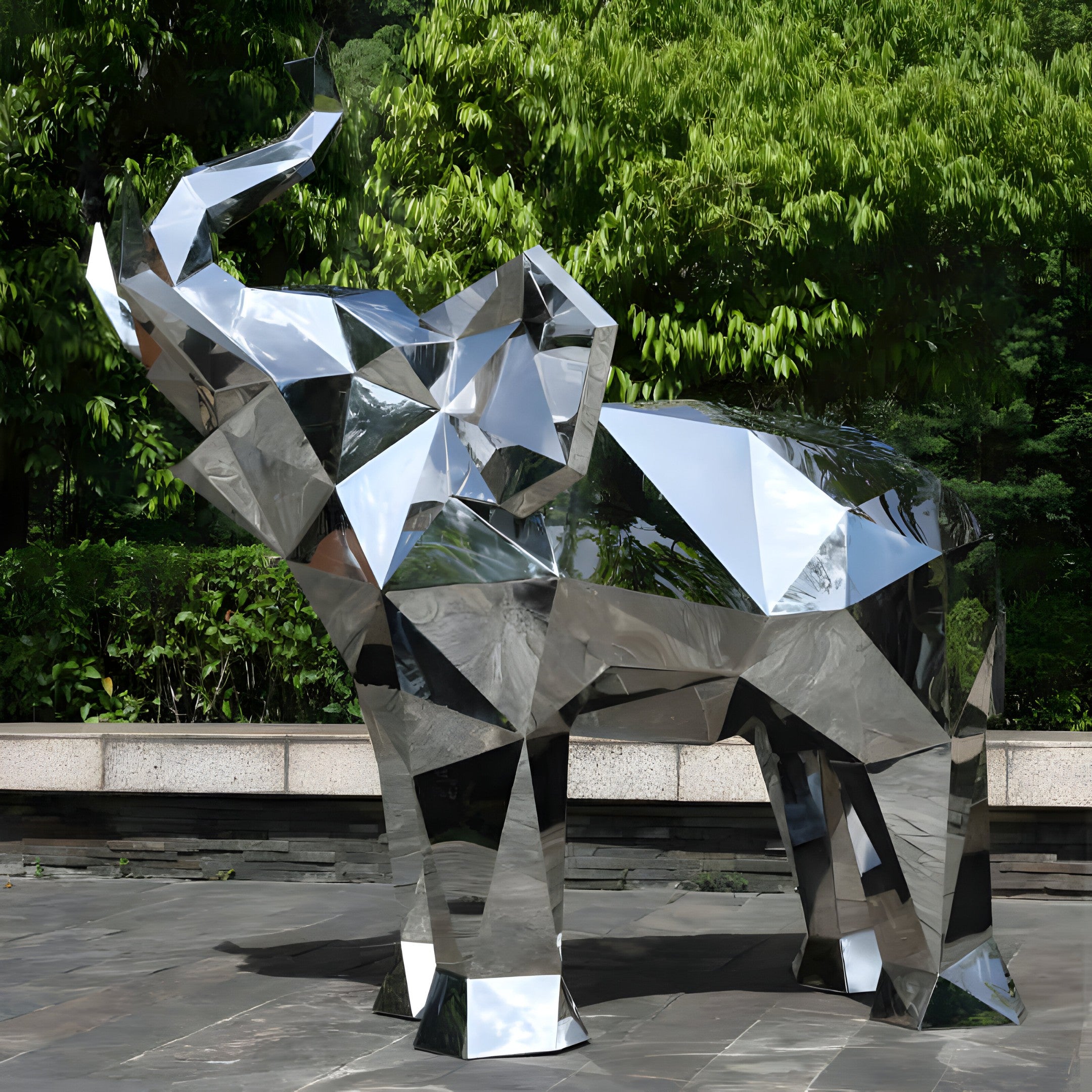 The elephant sculpture placed outdoors in a modern park setting.