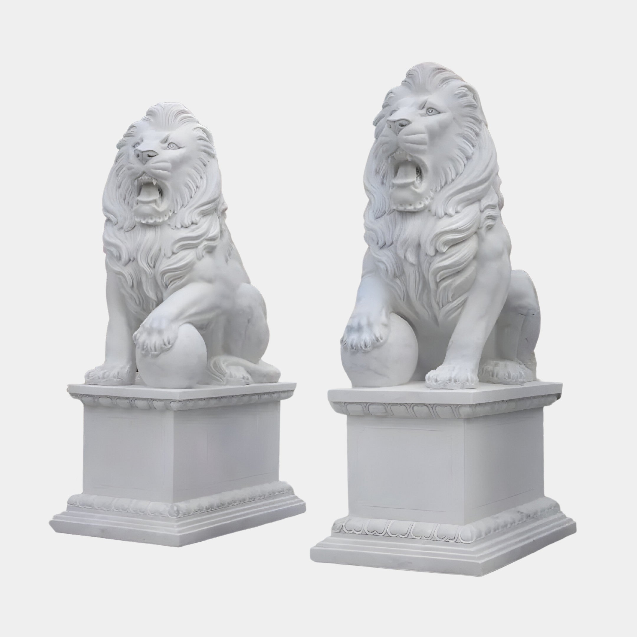 The Giant Lion With Ball Marble Outdoor Sculpture - Customised by Giant Sculptures features two grand marble lion statues seated atop rectangular pedestals. These outdoor sculptures exhibit open mouths and intricate carvings, highlighting detailed manes and expressive features.