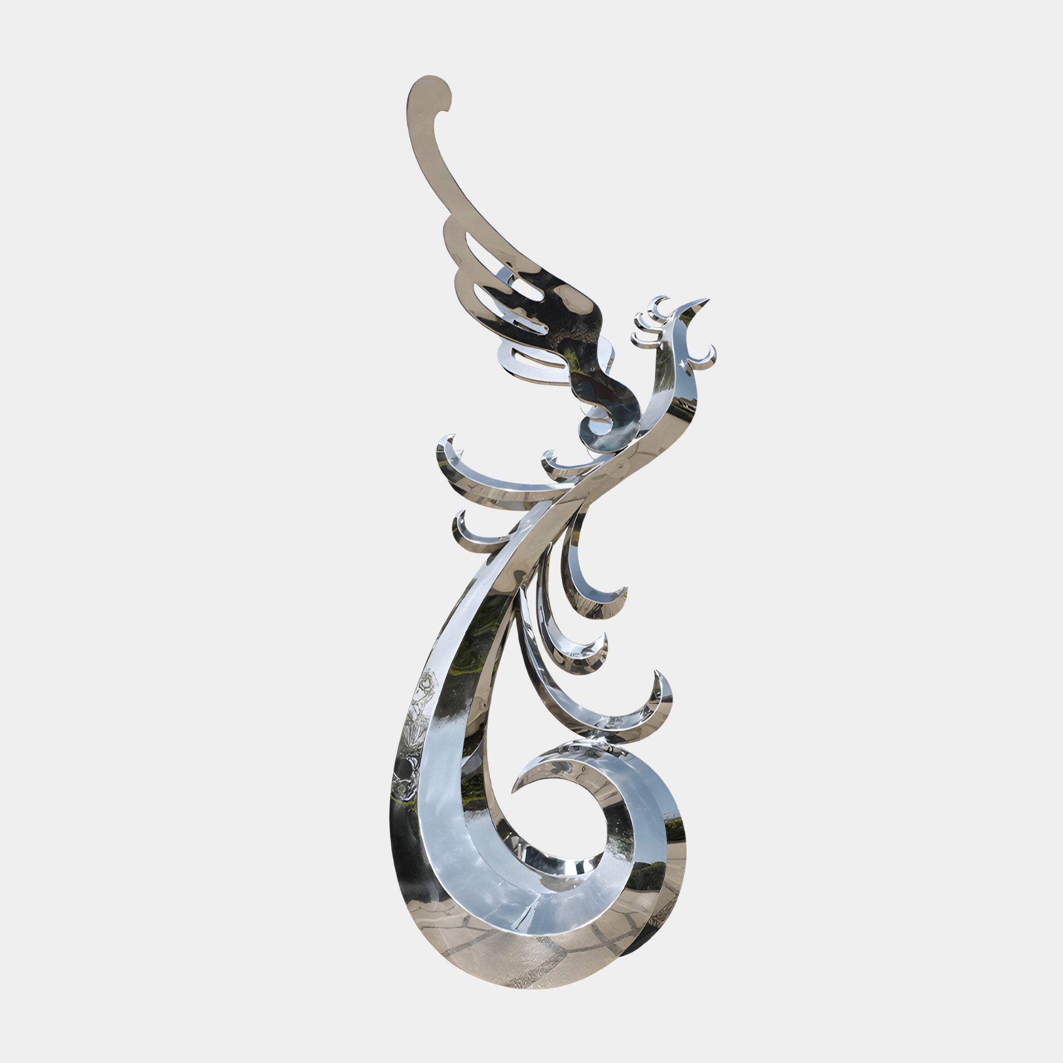 Phoenix sculpture with flowing, organic curves made from silver stainless steel.