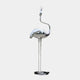 A sleek, abstract silver flamingo sculpture standing on a thin pole with a reflective, mirror-like surface.