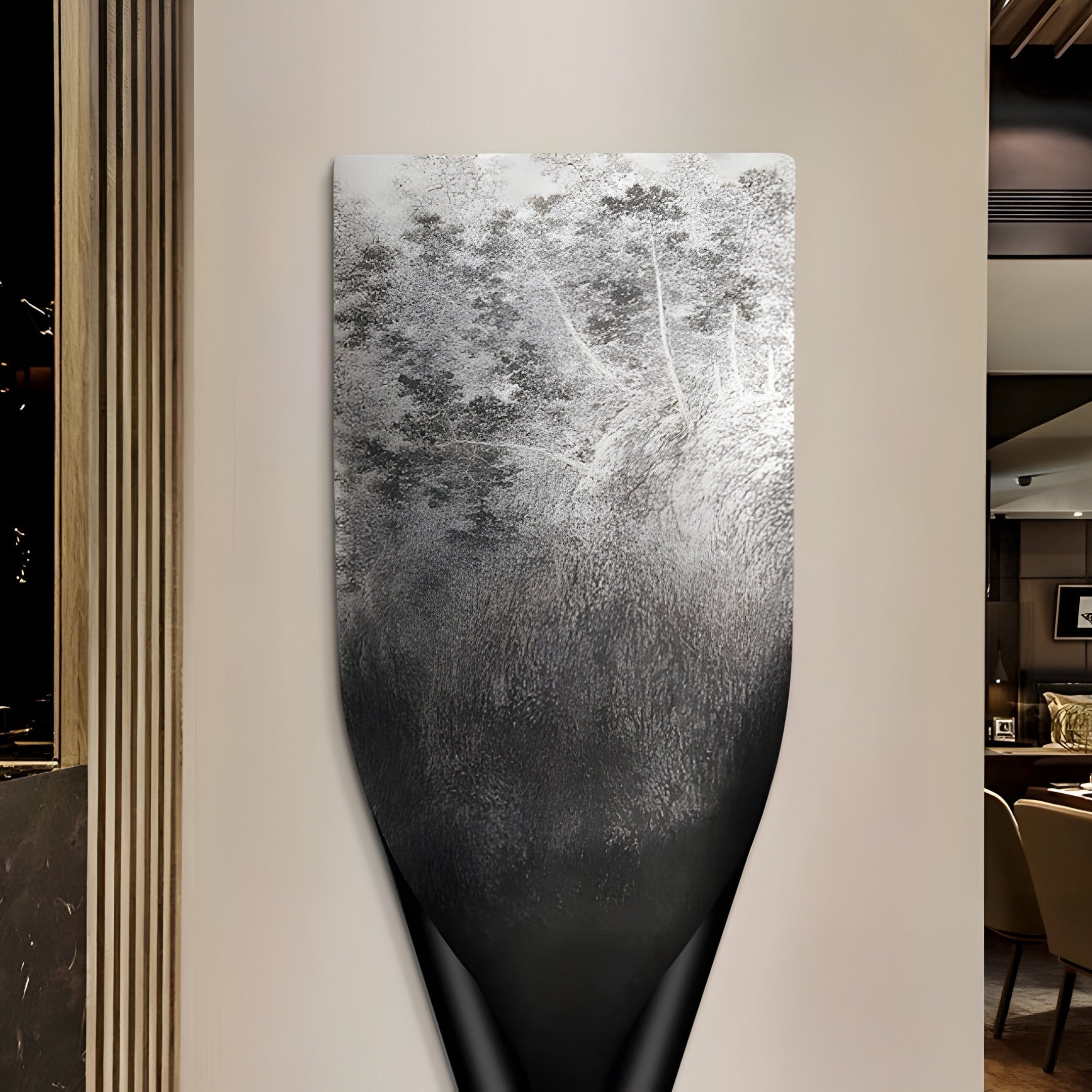 The room is adorned with the Echo Forest Textured Abstract Panel Metal Etched 3D Wall Art by Giant Sculptures, featuring cloud-like textures and monochromatic tones. It complements the modern, minimalistic decor and neutral walls beautifully, resembling a partially unrolled film negative.