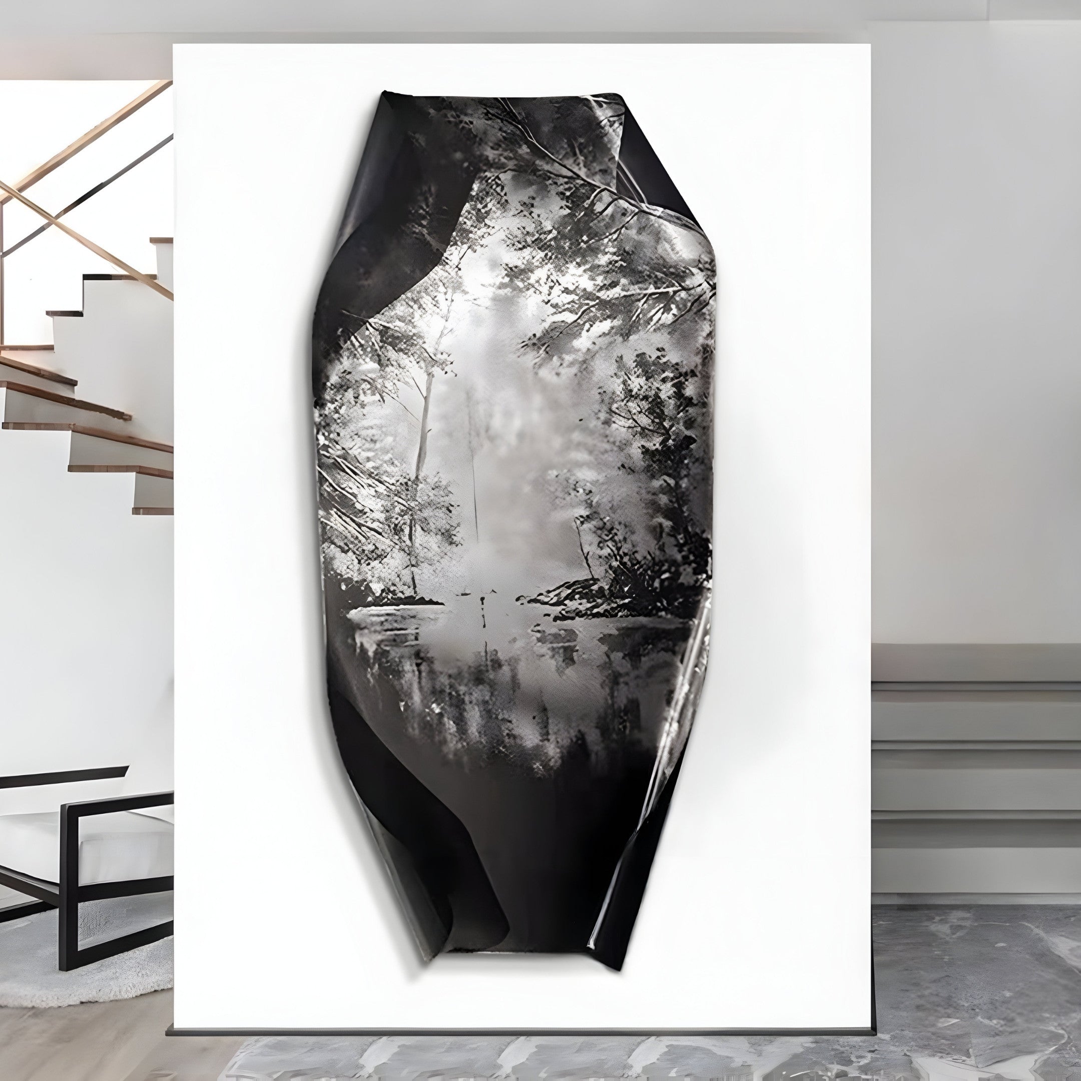 The Echo Waterscape Abstract Panel Metal Etched 3D Wall Art by Giant Sculptures brings nature-inspired elegance, resembling a forest scene on its glossy surface. It hangs on a white wall in a minimalist room with a staircase and bench visible in the background.