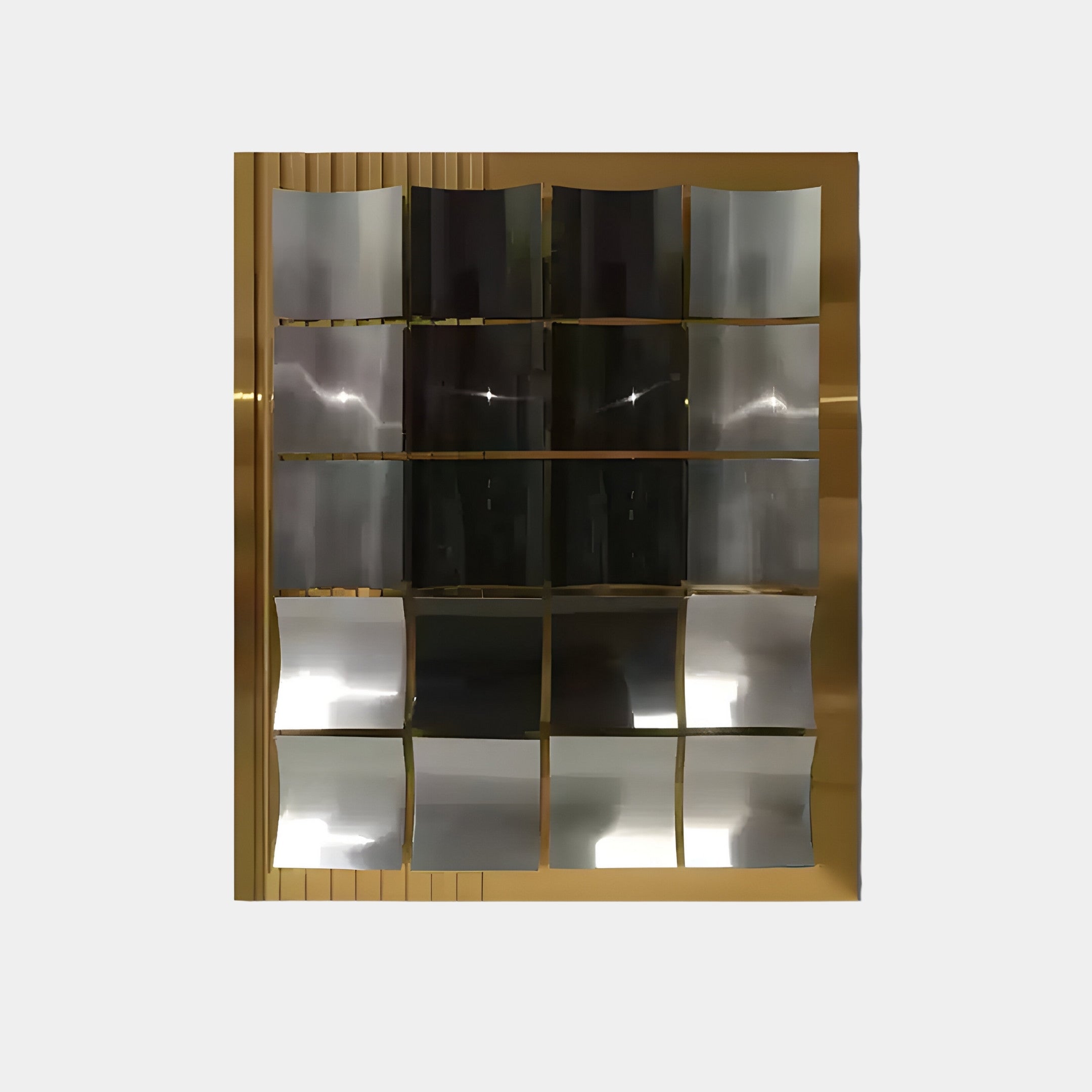 The Onda Gold & Silver Rippled Geometric Metal 3D Wall Art by Giant Sculptures features a grid of reflective metal panels framed in gold, creating dynamic reflections and enhancing the depth and texture of luxury modern interiors.