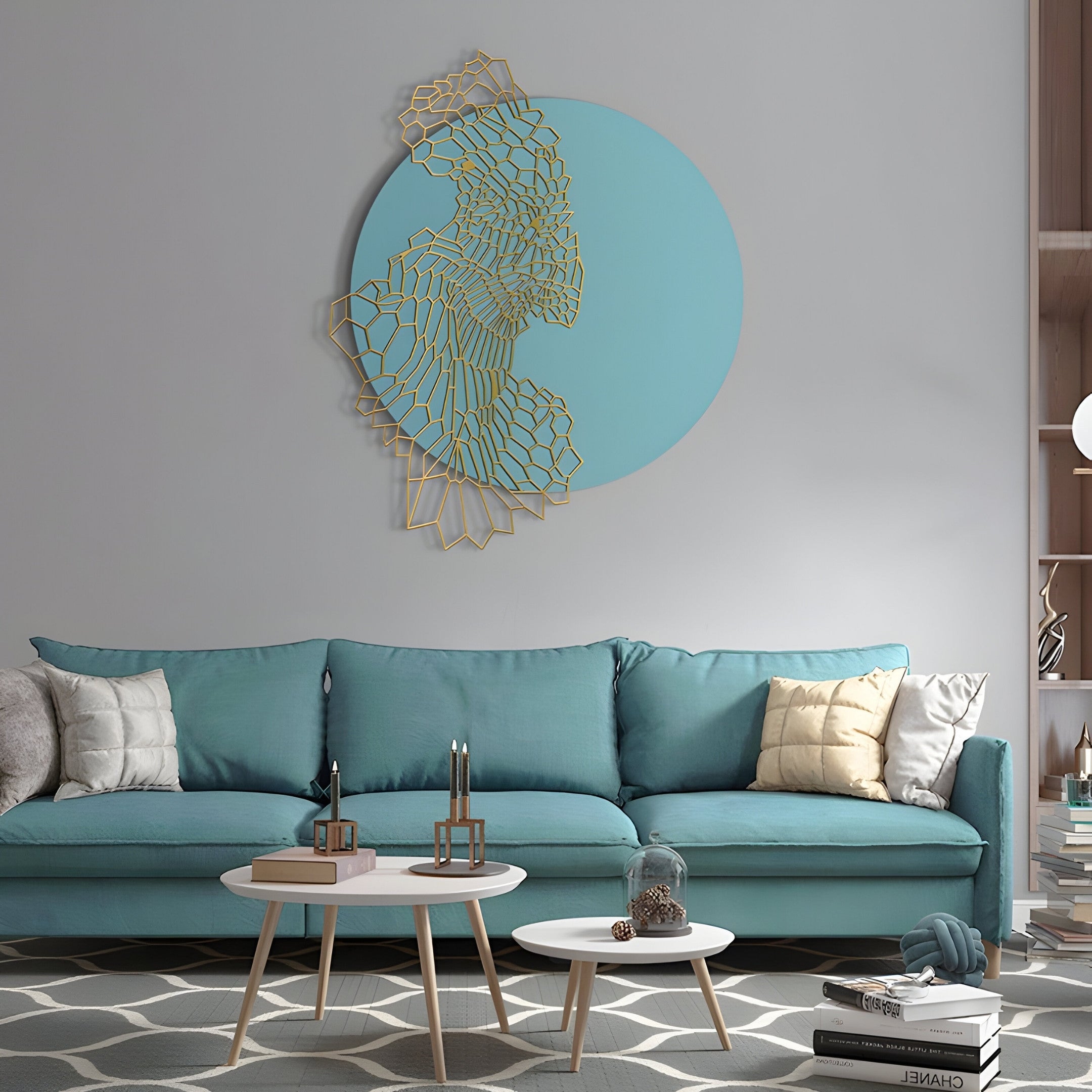 A contemporary interior includes a teal sofa with assorted pillows and two sleek white round coffee tables displaying decorative items. Above the sofa, Giant Sculptures Cellura Turquoise Geometric Flow Gold Wired Metal Wall Art adds elegance, while bookshelves and plants accentuate the modern aesthetic.