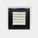  A framed 3D wall art piece featuring 25 white sculptural shapes resembling delicate, pleated cushions, arranged in a grid pattern. The white shapes are set against a black background within a sleek black frame.