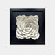 The Harmonia 3D Rose Wall Installation by Giant Sculptures features a white, layered floral design that spirals outward on a black background. Its simple black frame enhances the intricate details of this timeless and elegant piece.