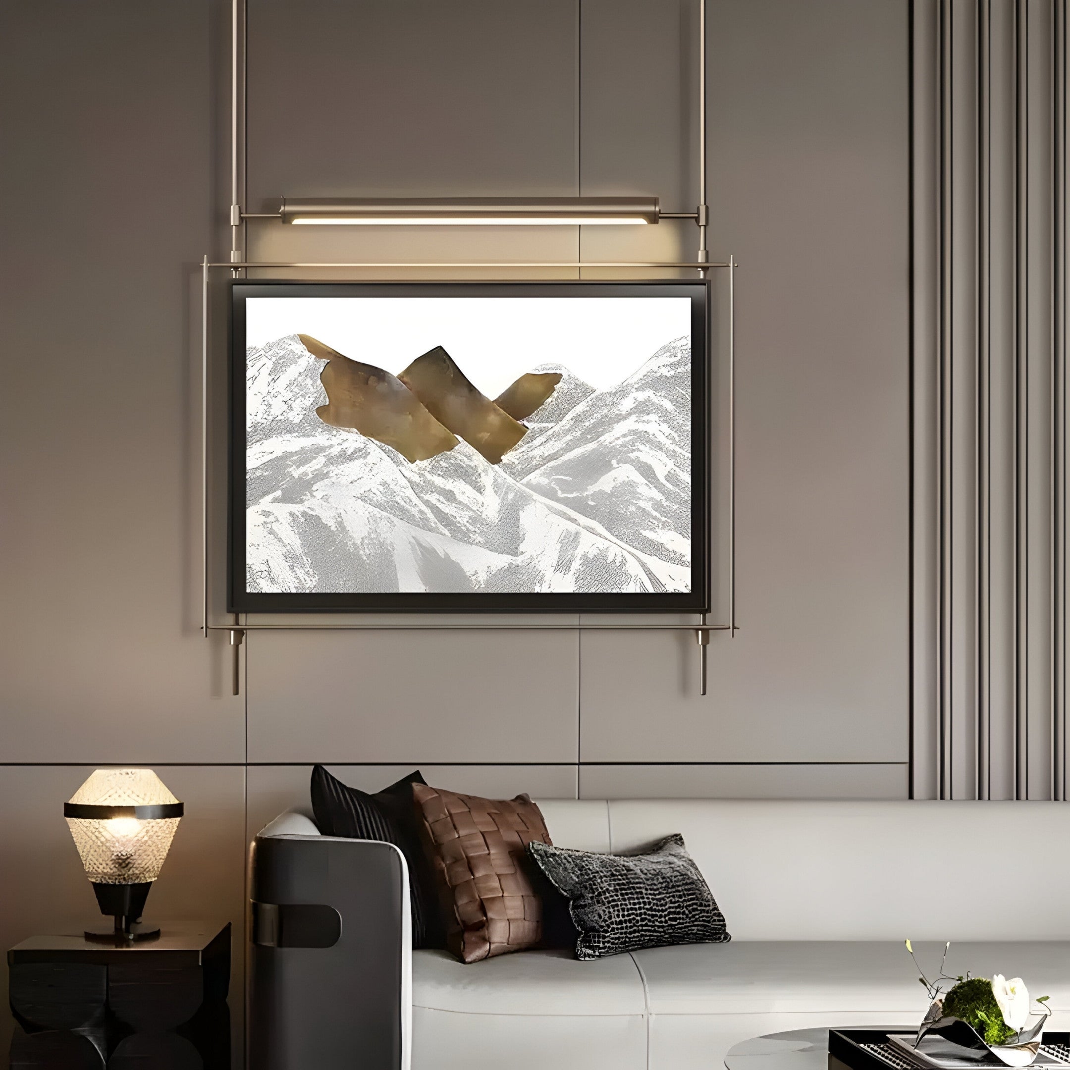 A modern living room showcases a white sofa with dark brown and patterned cushions, accented by the Celestique Mountain Peaks Framed LED Wall Art by Giant Sculptures. A unique lamp on a side table casts a warm glow.