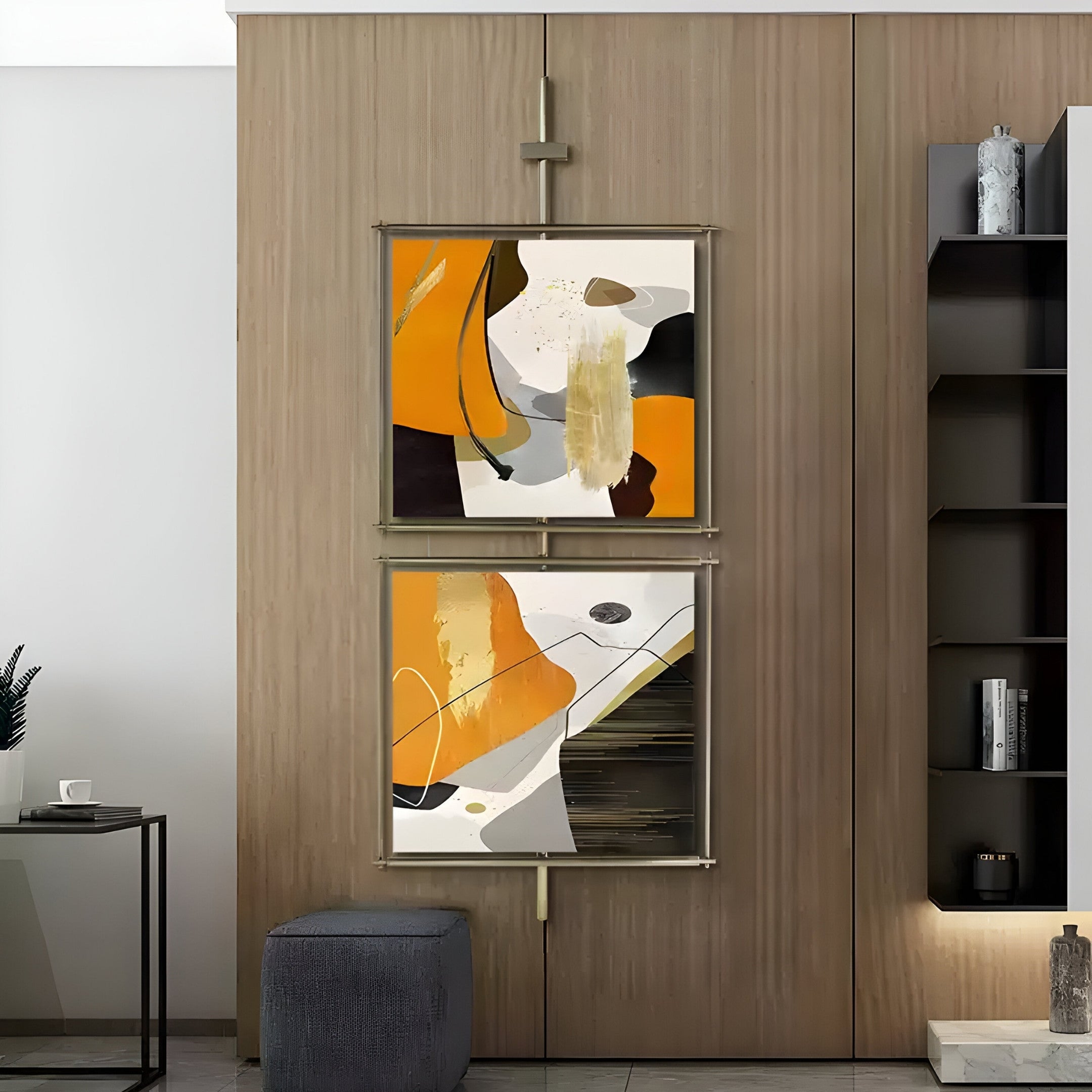 A contemporary living room features a Giant Sculptures Vortice Energy Flow Abstract Dual Panel Wall Art with orange, black, and white shapes against a wooden wall. A gray chair is placed to the left, and shelves with a decorative vase are on the right.