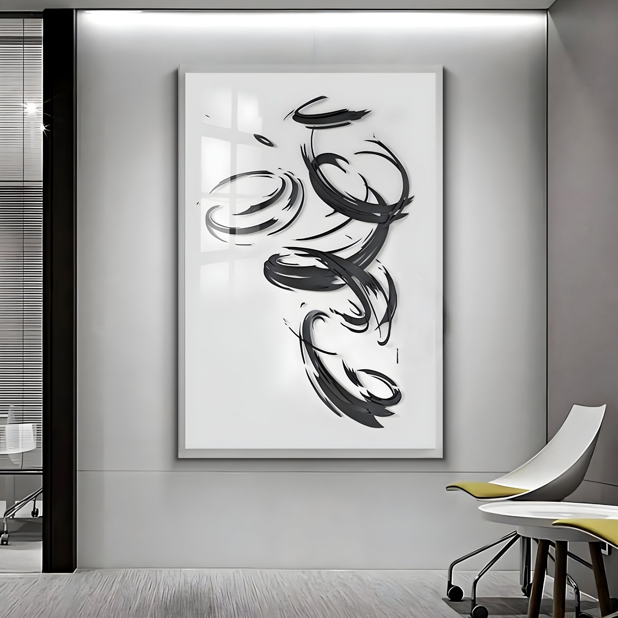 A large white canvas on a modern gray wall features the Zephyr Monochrome Motion Abstract Metal Wall Art by Giant Sculptures. The rooms contemporary design is enhanced with minimalistic decor, including a glass partition and sleek yellow and white chairs.