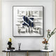 Elegant 3D wall art with navy blue and white ceramic shapes displayed above a black console table. The contemporary sculpture enhances a sophisticated modern interior.