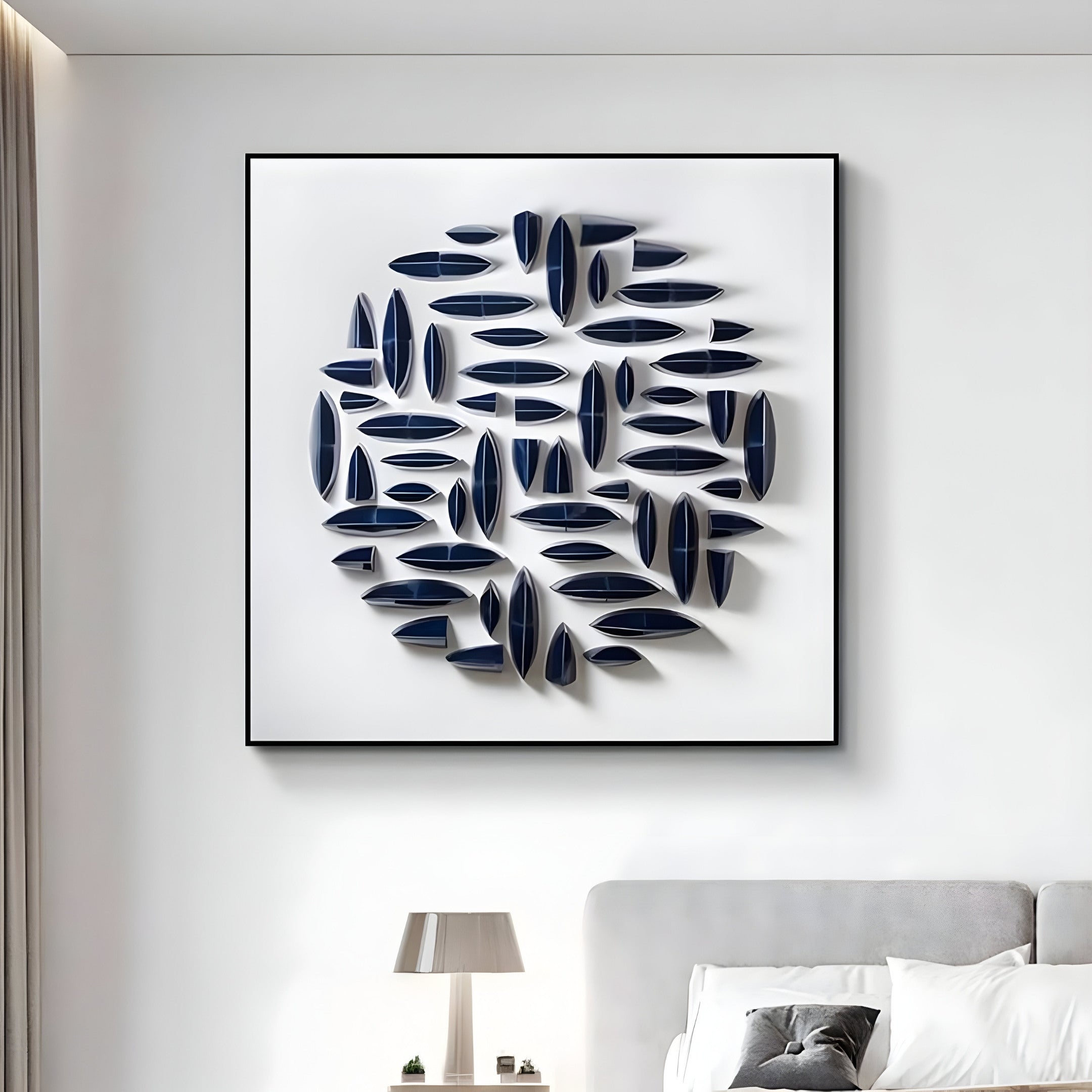 Large circular 3D wall art with navy blue ceramic elements displayed above a bed in a modern bedroom. The geometric design adds texture and depth to the clean, minimalist space.