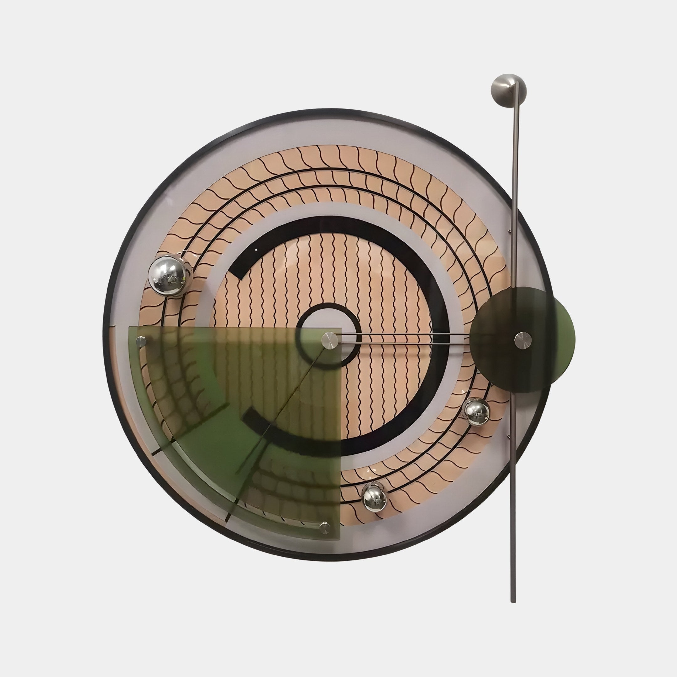 The Circulo Modern Kinetic Metal Wall Art by Giant Sculptures features a modern industrial vibe with geometric patterns in wood, black, and green tones. Metallic balls at intervals and a long sleek pendulum decorate the right side against a white background.