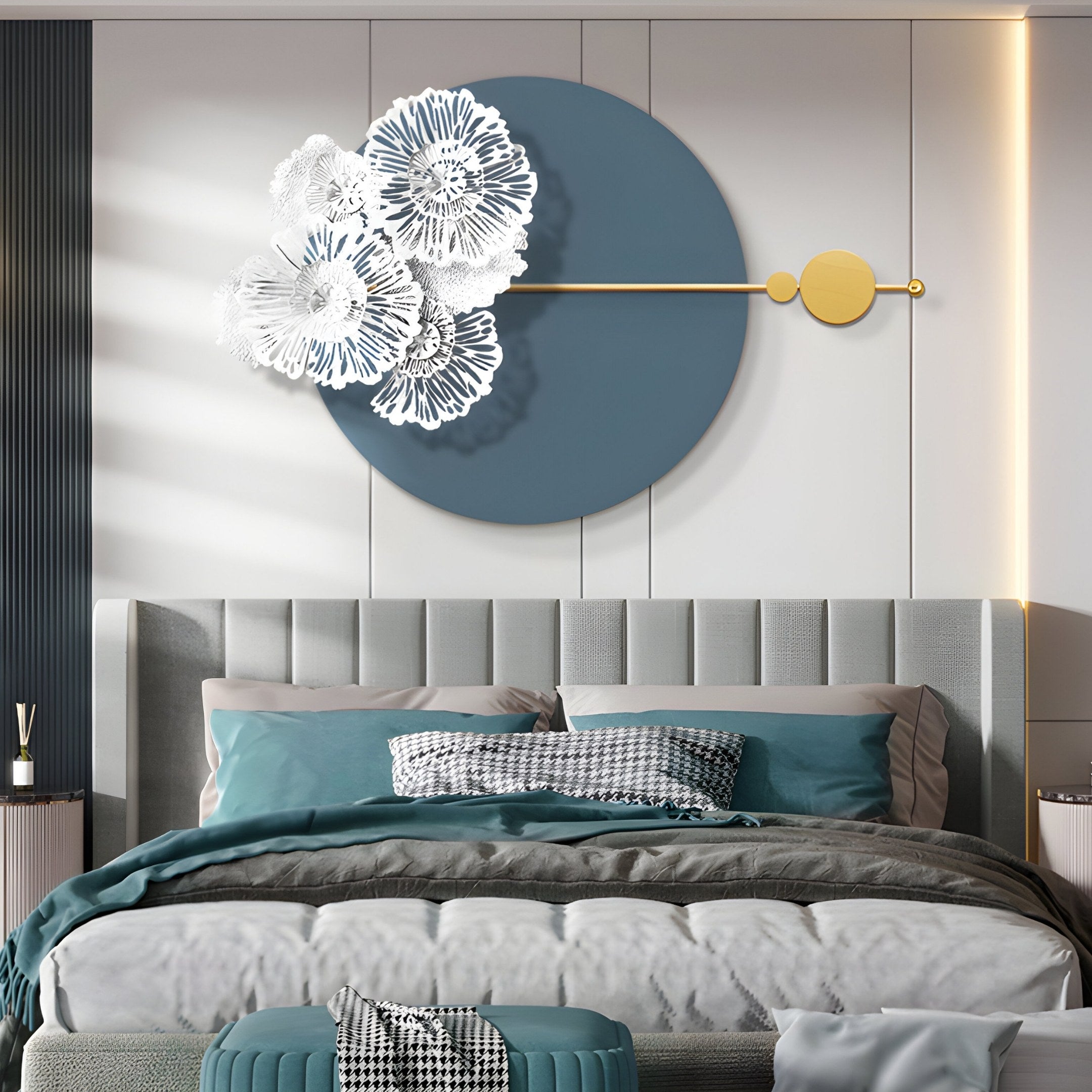 A modern minimalist bedroom features Giant Sculptures Blossom Halo Ocean Grey Round Floral Decorative Wall Art, showcasing blue circles with white floral elements and a gold accent. The bed has teal and gray bedding with two checkered pillows, while soft lighting creates a serene atmosphere.