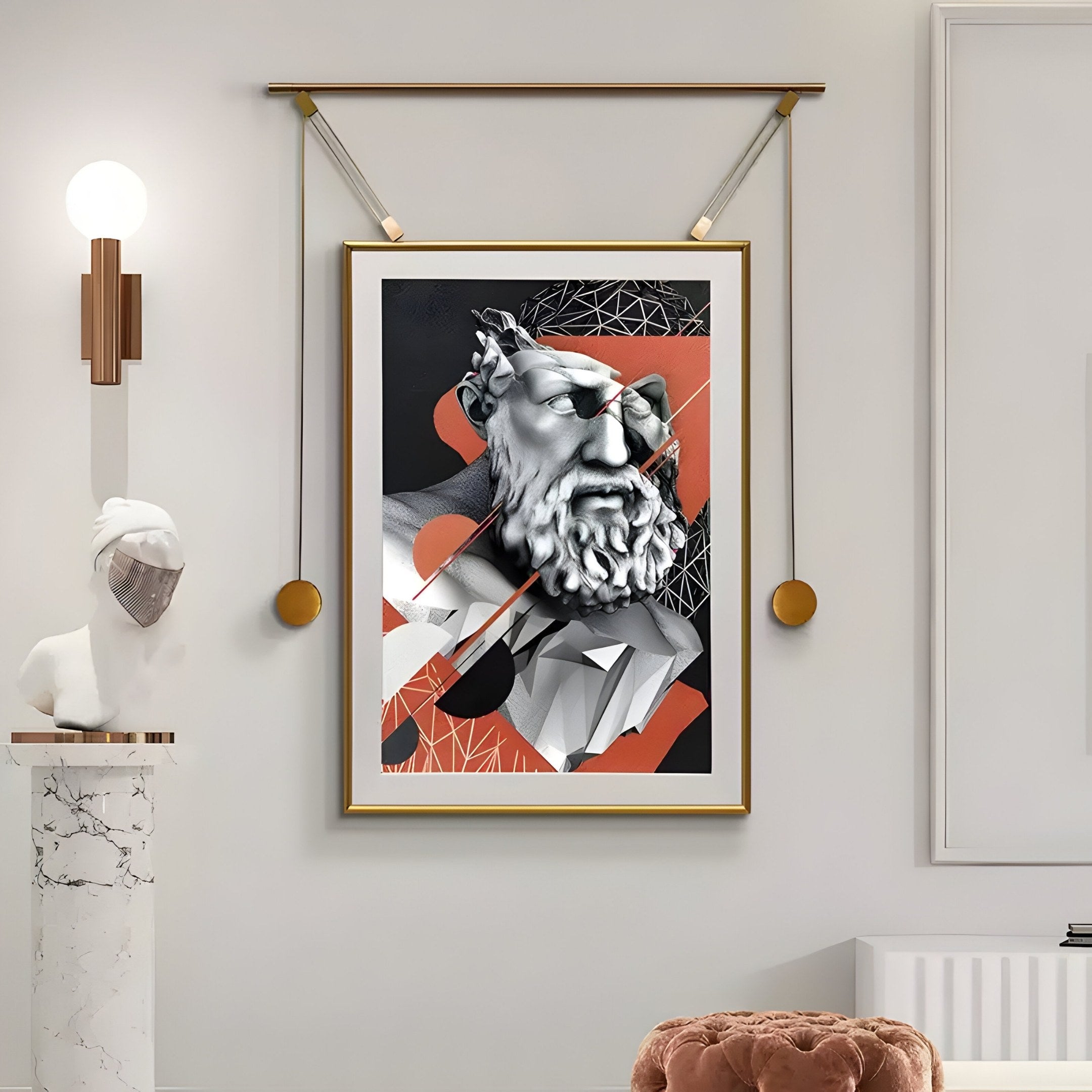 A modern living room exudes contemporary elegance with the Eterna Classics Renaissance Portrait Golden Frame Wall Art by Giant Sculptures, a marble bust on a column, warm lighting from a wall sconce, and a plush, round seating area. The artworks gold frame and orange accents add warmth.