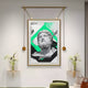 The Eterna Classics Zeus Replica Portrait by Giant Sculptures, a Greco-Roman styled artwork in a golden frame, is flanked by two small shelves with vases of white flowers and enhanced by two spotlights. It sits against green geometric elements on the wall.